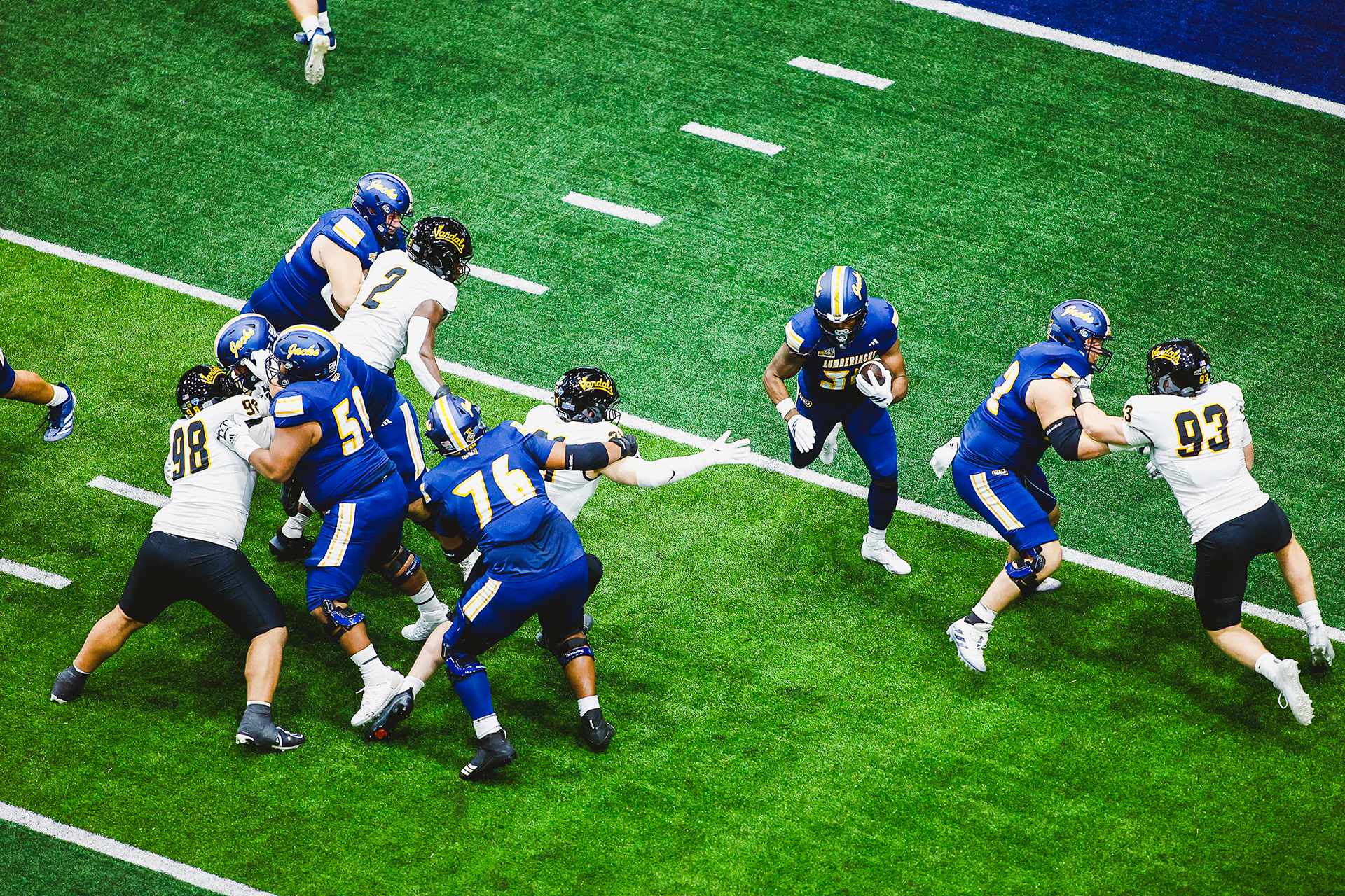 Redshirt junior running back Seth Cromwell (34) rushes the ball for a first down during the Big Sky Conference game against The University of Idaho on Findlay Toyota Field in The J. Lawrence Walkup Skydome, Oct. 31. 