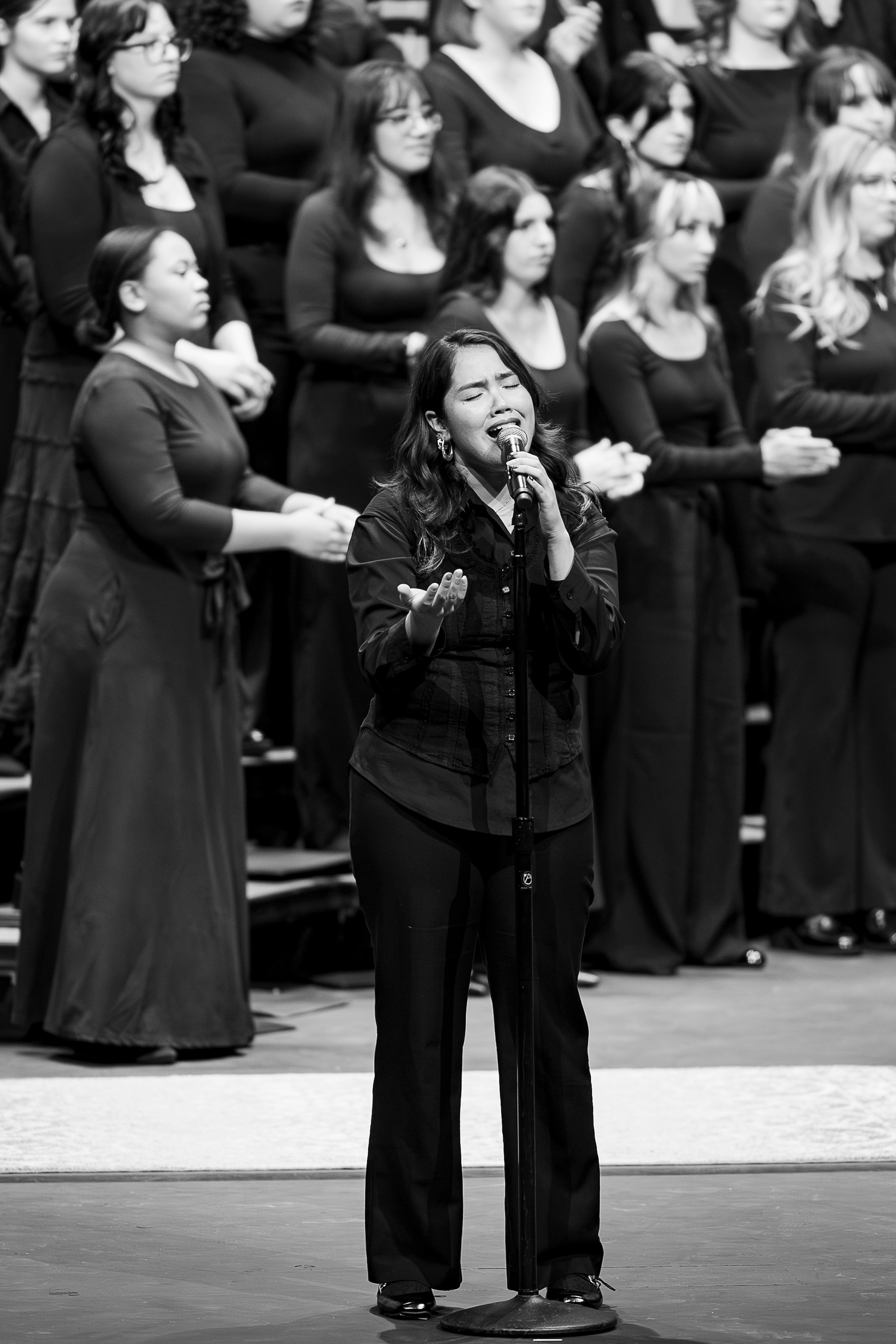 Leeana Dalumpines sings a solo during Vox Astra's set of the Fall Festival of Choirs in Ardrey Auditorium, Oct. 19