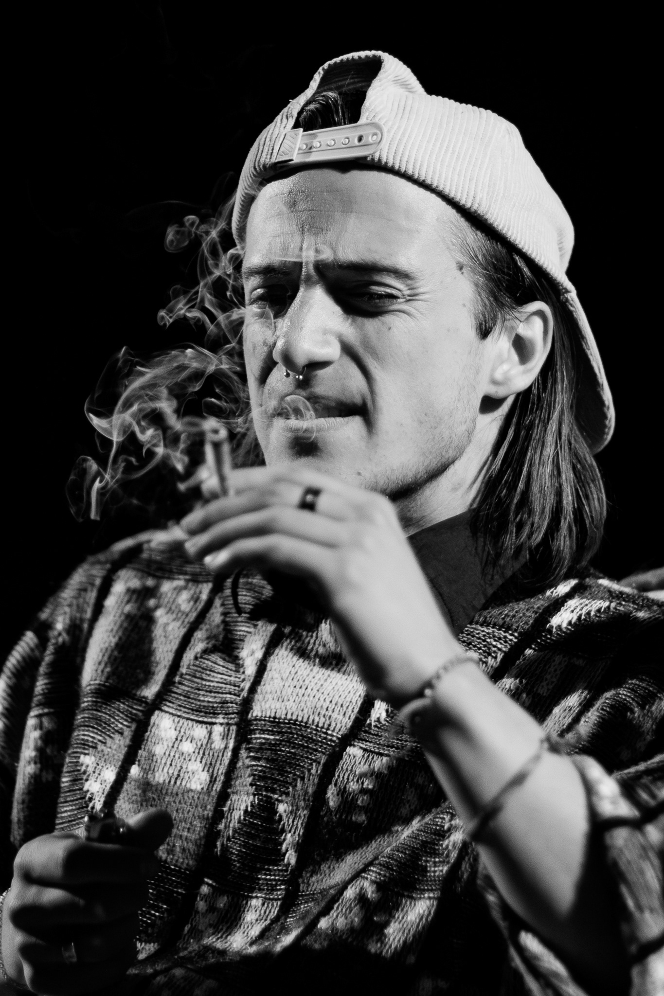 Extra Ethan Fish smokes a prop cigarette during the final day of filming for Parker Hall's short film, "We Weren't Meant To Be Saved". Shooting for this part was super hard because the only lighting that was out there was the little set lights, but I thankfully had a really good in low light. And with the aperture able to go down to 1.2, I was able to properly expose for him as the subject as well as the smoke that was coming from the cigarette. Overall, I am super happy with this photo. Taken on the Canon EF 85mm f/1.2.  March 23, 2026.