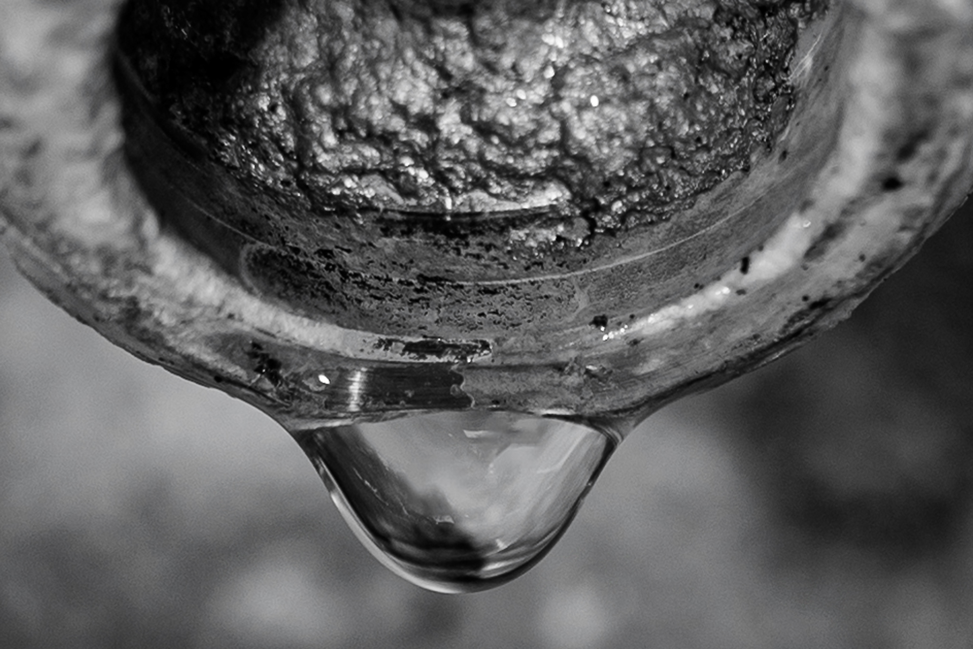 A water droplet hangs out of a faucet outside of Aloha Hawaiian BBQ in Flagstaff. When I had decided to do a macro project for this class, I knew that I wanted a water photo for sure. But I also wanted to challenge myself and make it an exciting photo also. So by luckily finding one, I was also really excited to see the texture that is behind the droplet from the inside of the faucet. Taken on the Canon EF 100mm Macro lens f/2.8. April 13, 2026. 