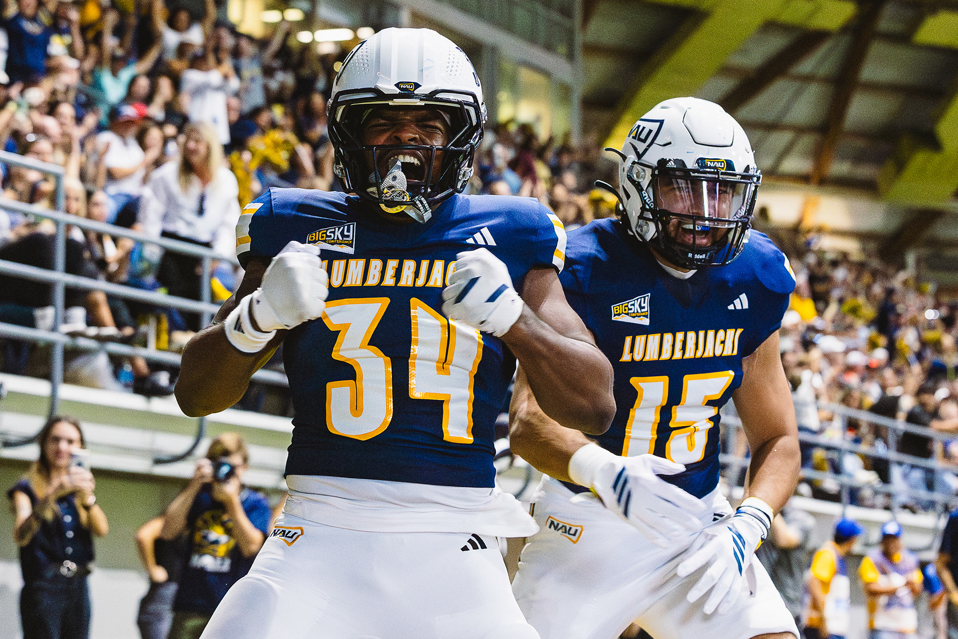 Redshirt junior running back Seth Cromwell (34) celebrates a touchdown during the non-conference football game against Utah Tech on Findlay Toyota Field inside the J. Lawrence Walkup Skydome, Sept. 6. 