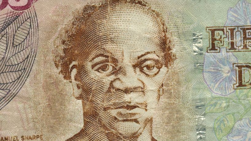 A portrait of Samuel Sharpe, an enslaved Jamaican who was the leader of the widespread 1831–32 Baptist War slave rebellion in Jamaica. His portrait is on the 50 Jamaican dollar banknote.
