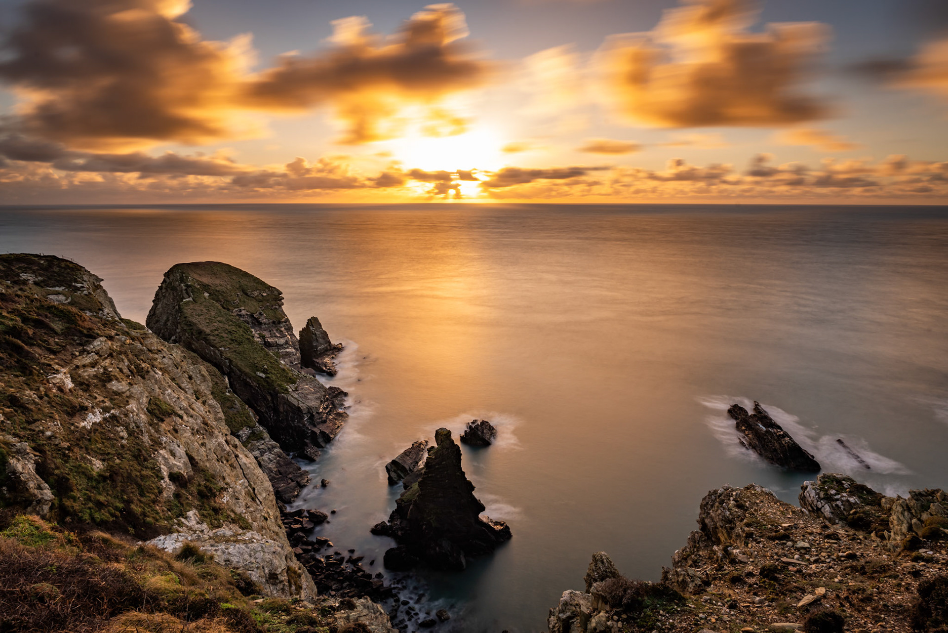 Sunset over the sea on the Island of Angelsey , North Wales