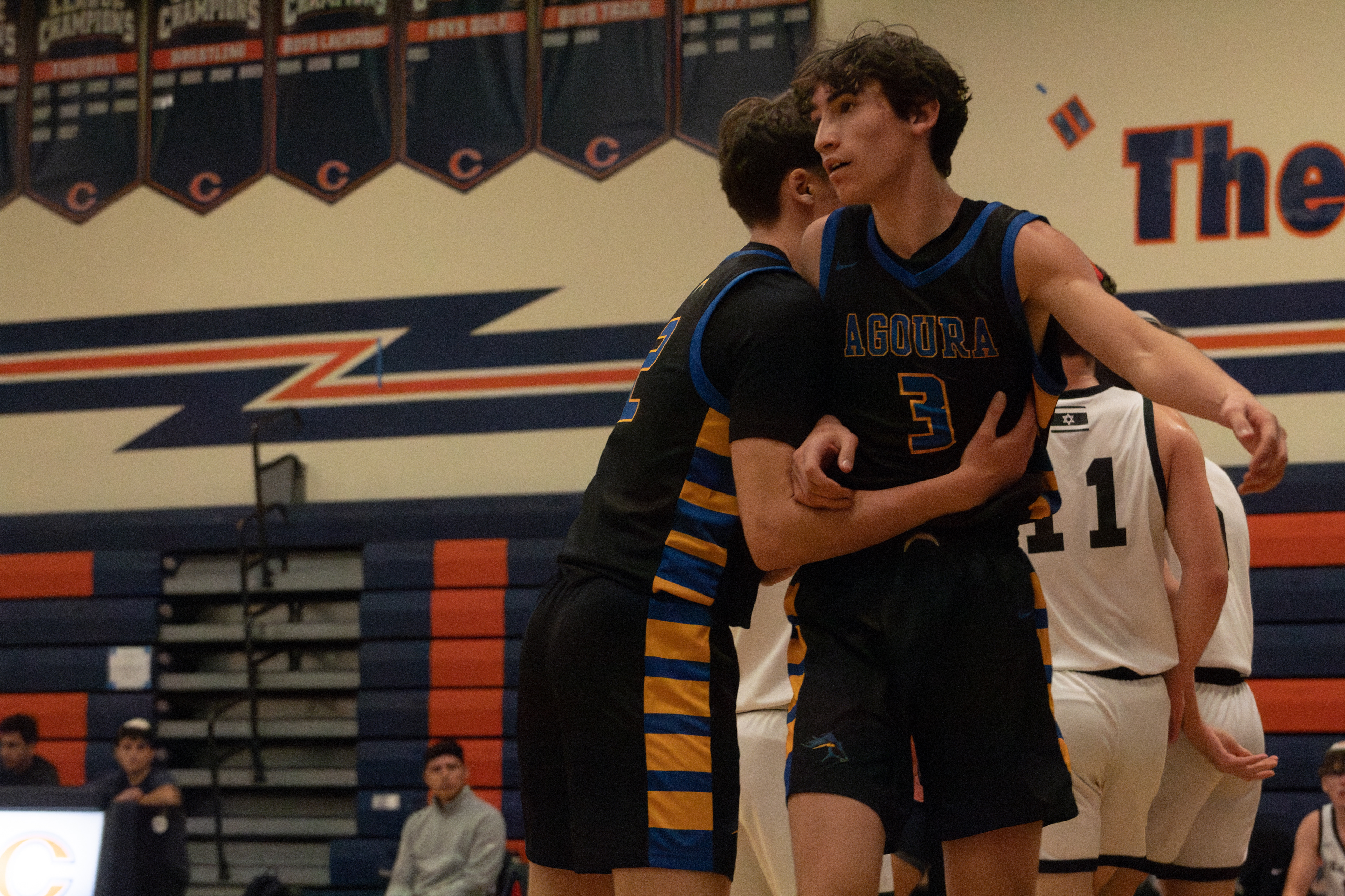 Mathis Simonet (#2) celebrating with Lucas Friedlander (#3) after a made basket. Photo taken on December 16th, 2024. Photo by Connor Roche 