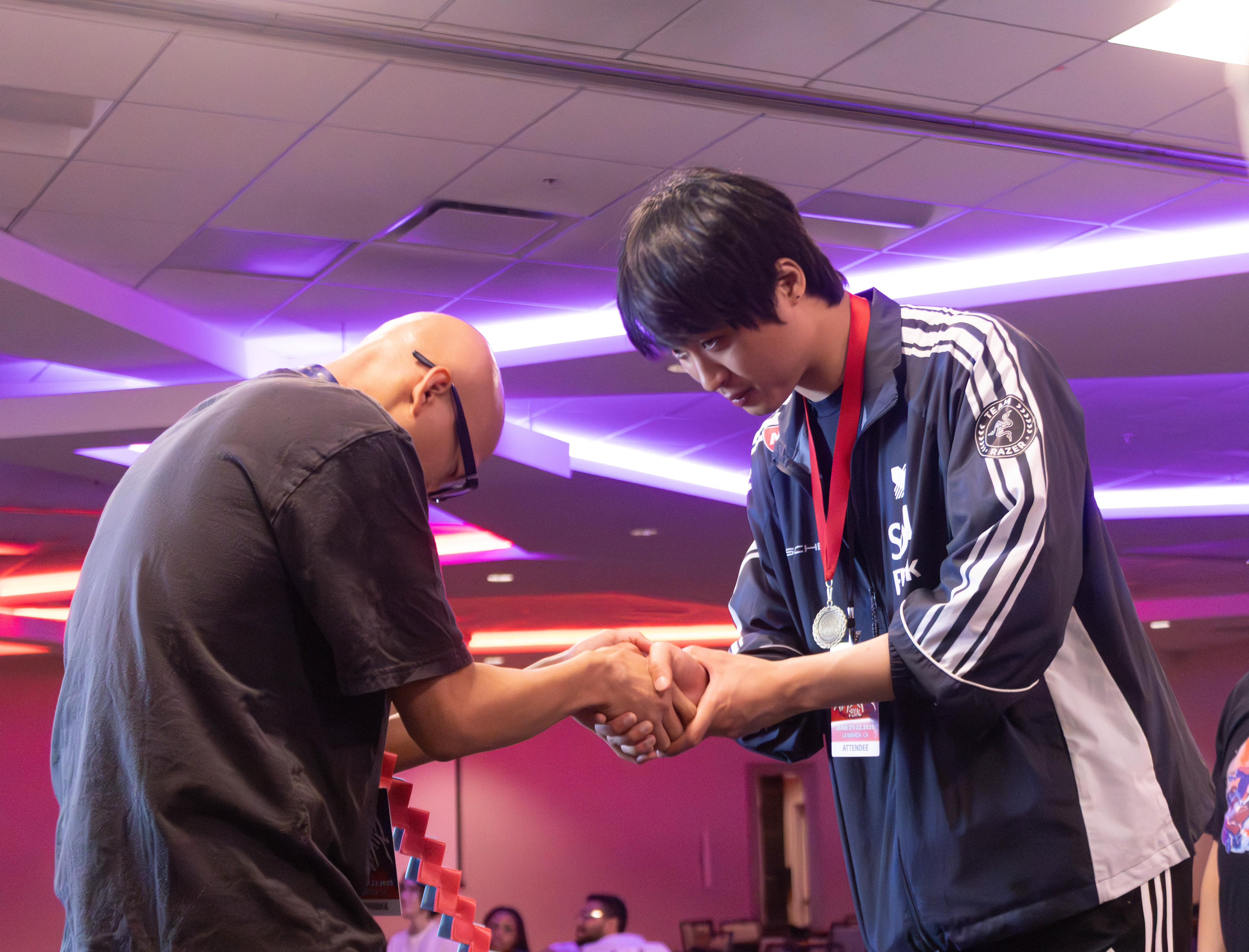 Lowhigh receives his award for 2nd place at CHAINSHIFT 2025.