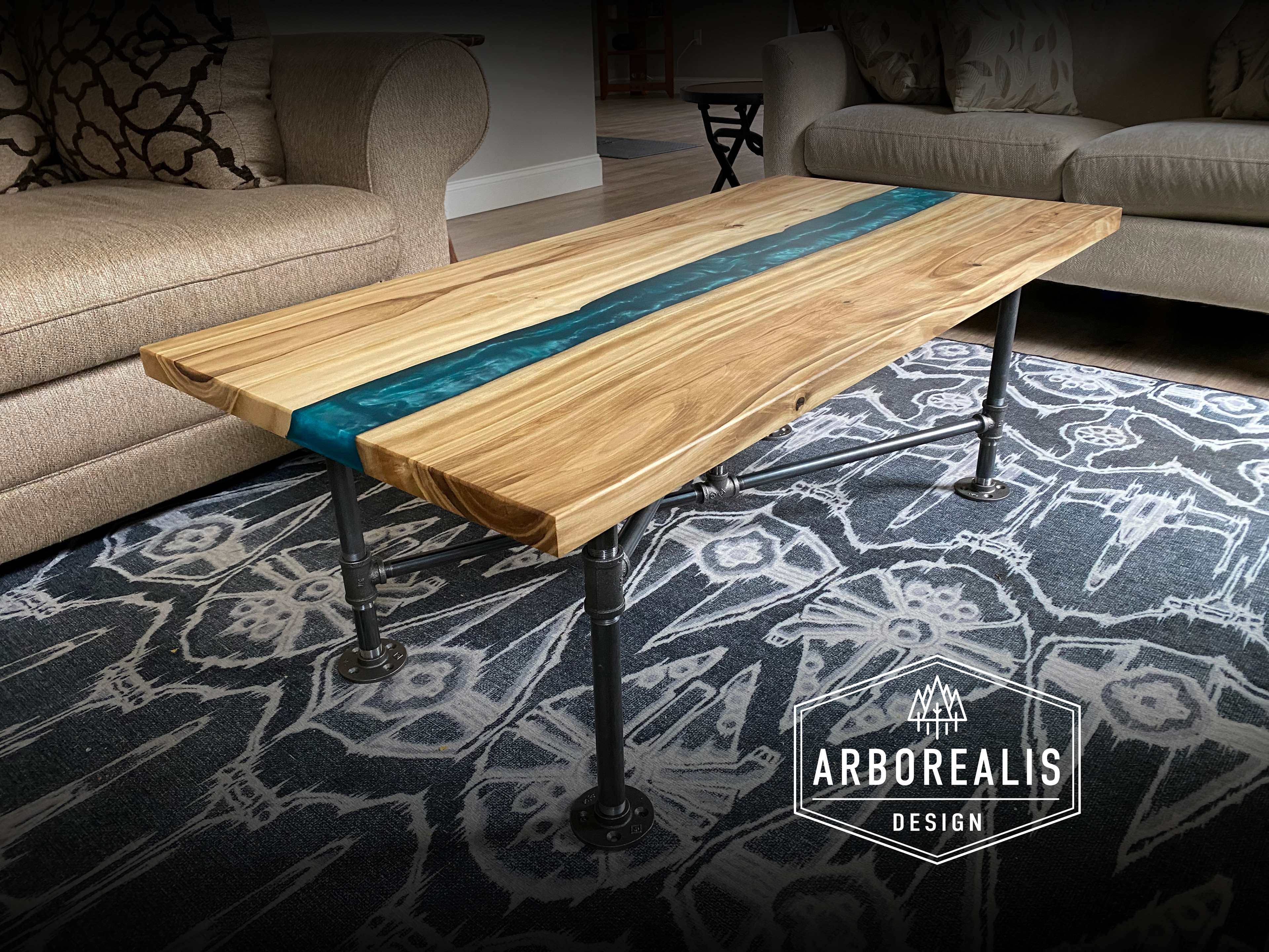 Arborealis Design is a company that I started in 2021. We make custom handcrafted wood and resin furniture and decor inspired by nature and designed to last for generations.