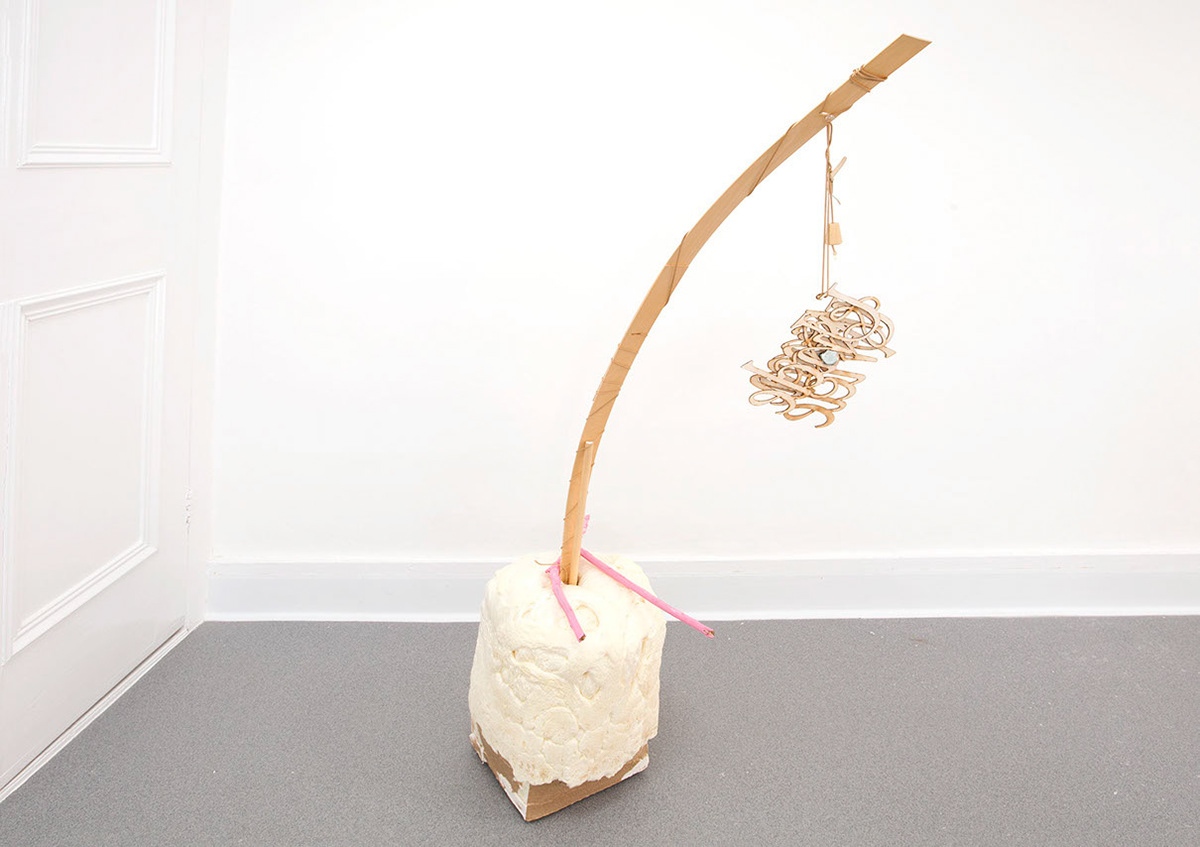 Unwriting (2016), expanding foam, wood, blind
