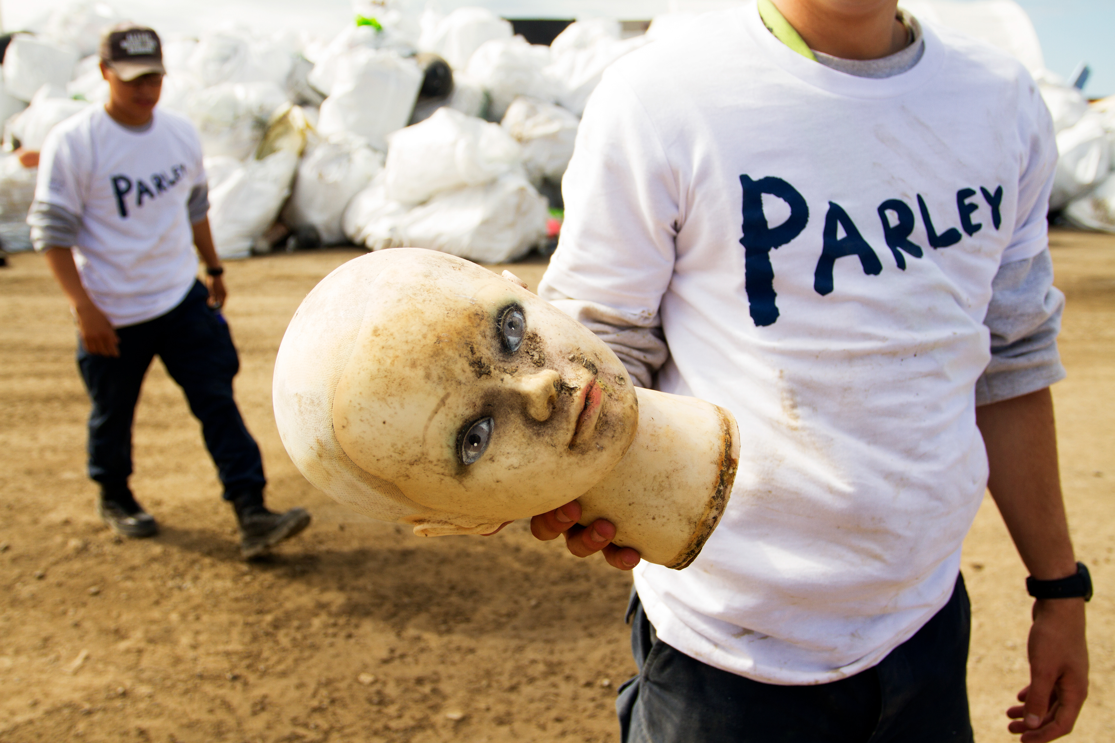 Volunteers find an array of interesting items in the piles of debris found in the Pacific Ocean during the Great Alaska Marine Debris Sorting Project at the Port of Anchorage on Saturday, July 16, 2016. Tires, soccer balls and a refrigerator were among some of the more eye-catching things found.
