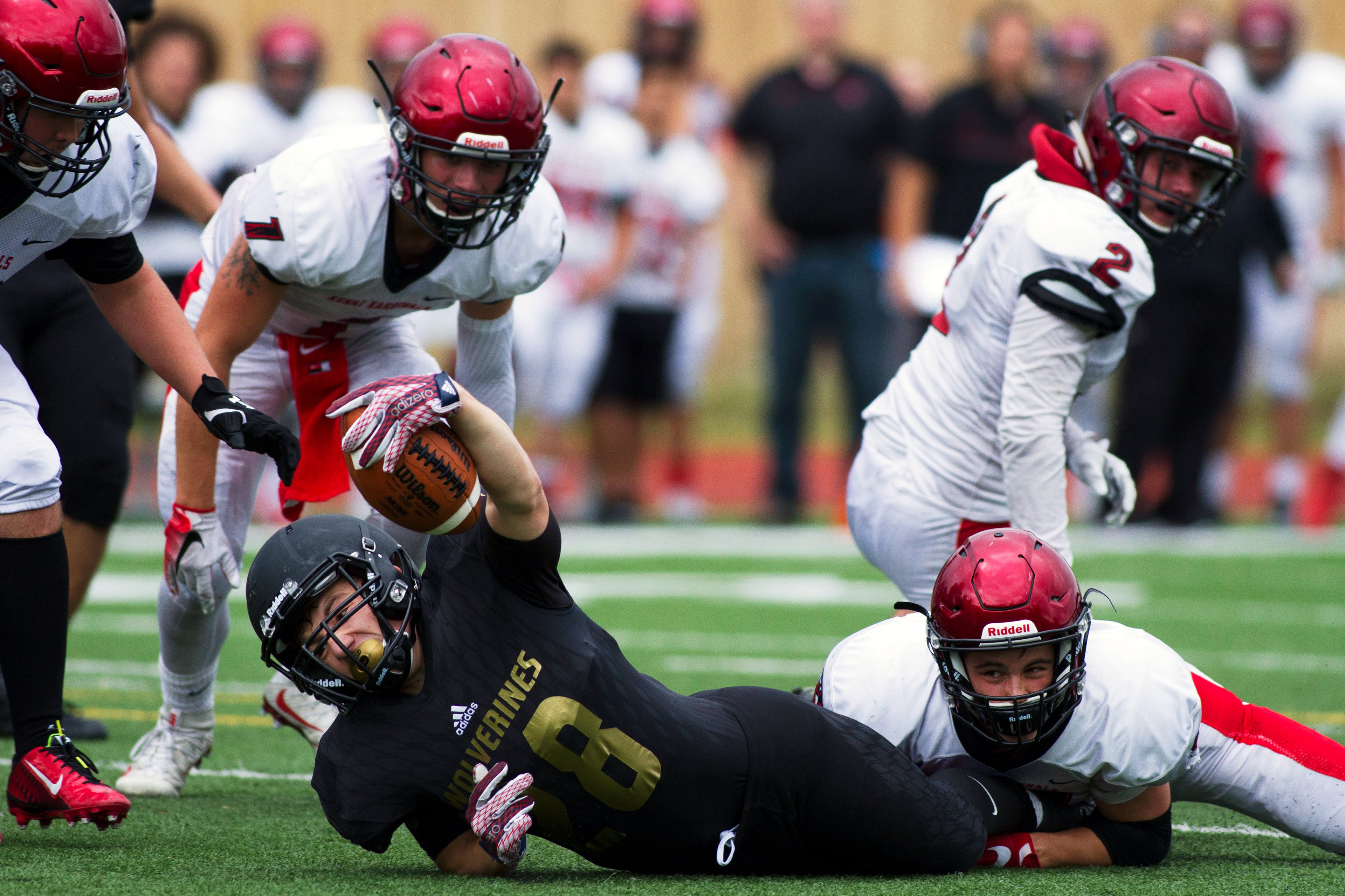 South Anchorage Wolverine Evan Benedict reaches for the endzone, but misses by a few yards during the game against the Kenia Kardinals at South Anchorage High School on Saturday, August 13, 2016. South Anchorage won 27-13.