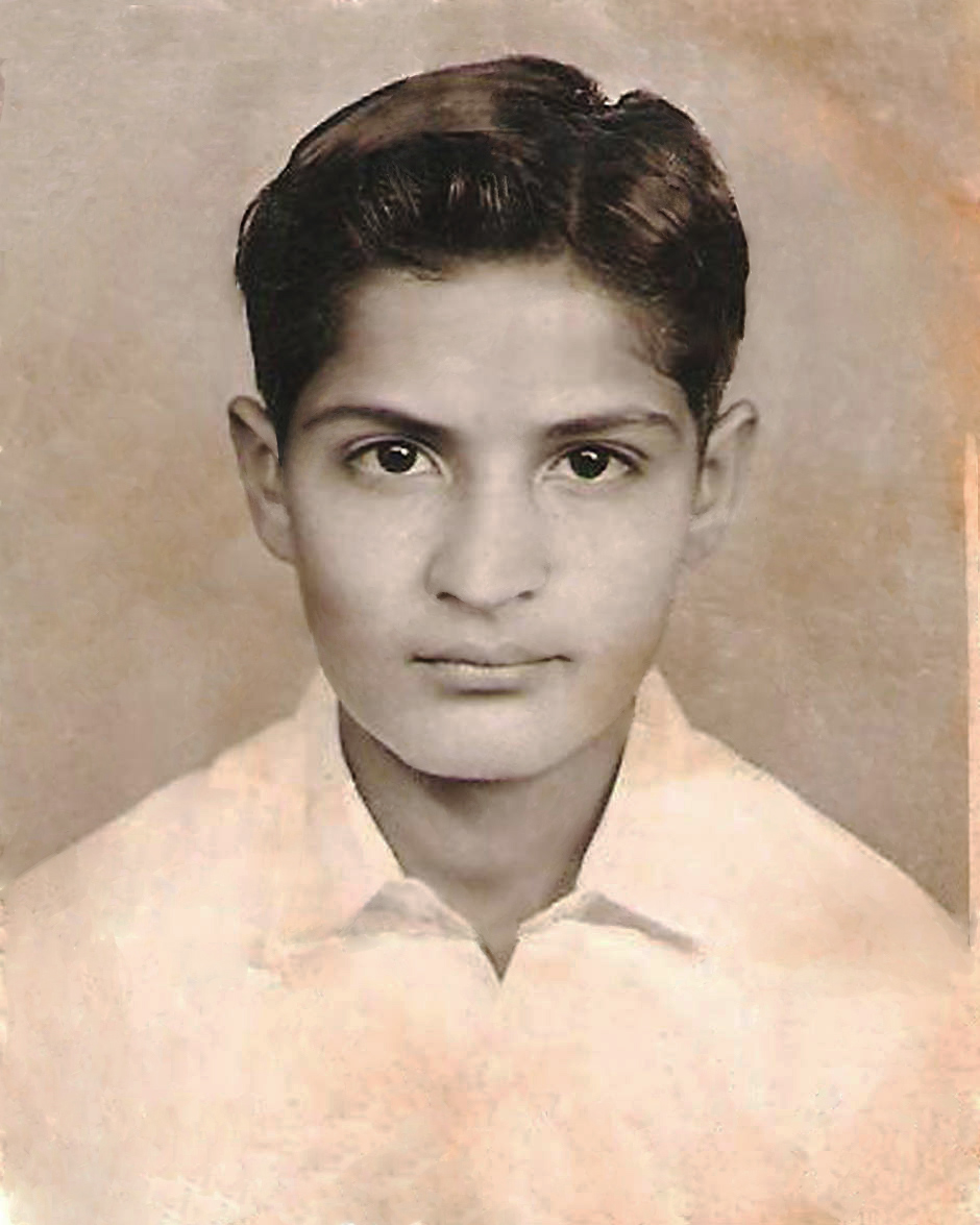 Same photo of young man restored.