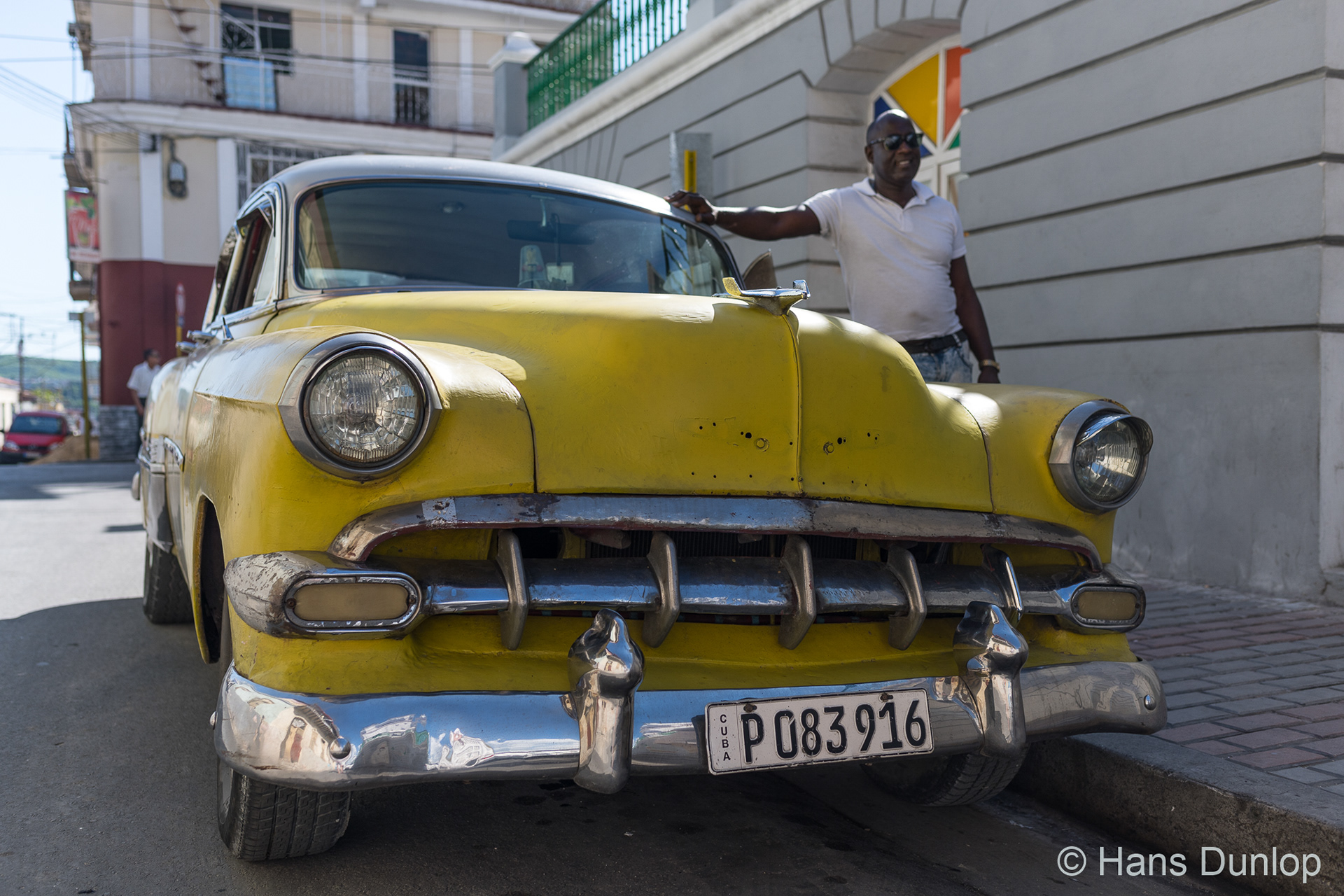 Titi, our driver for the day is has to save a lot of  money to make his car "as new" again