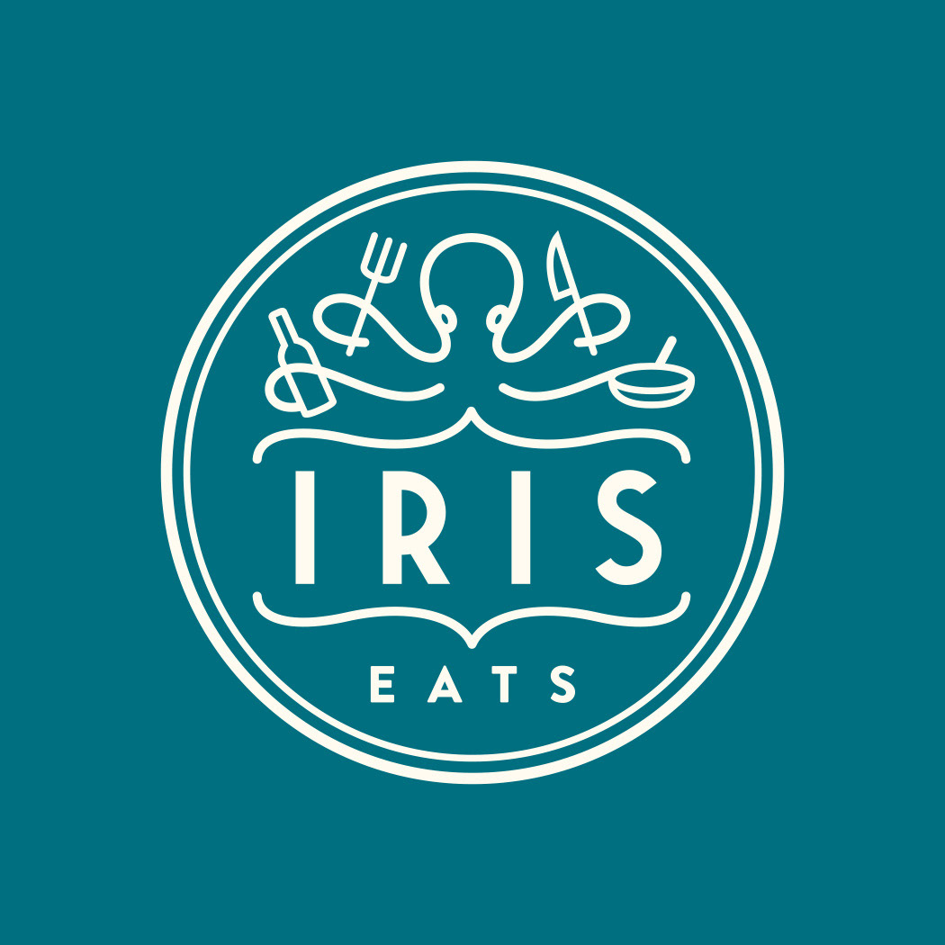 Iris Eats Restaurant circle logo badge design featuring an octopus holding various cooking items by Scott Whitehouse.