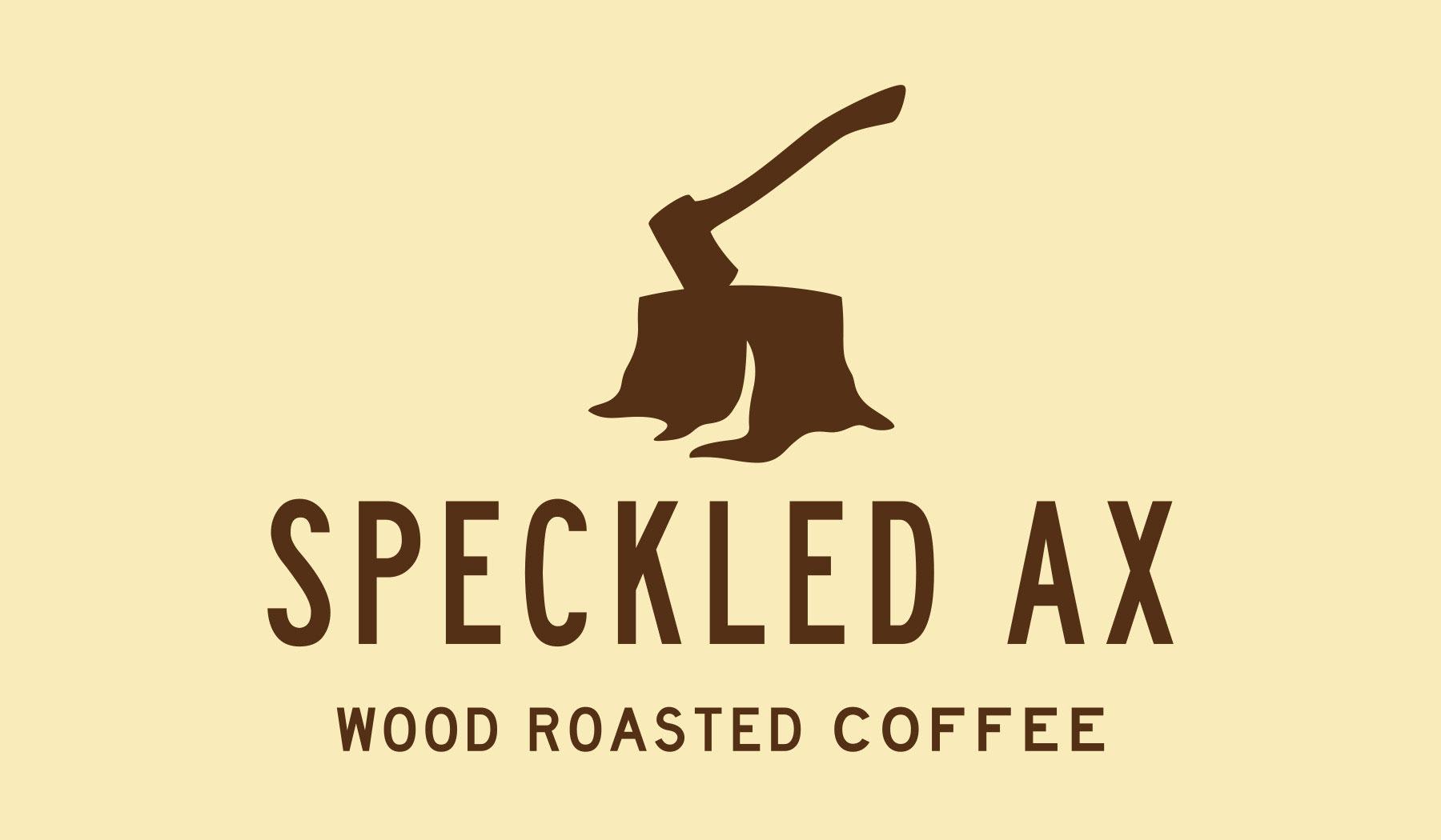 Speckled Ax Wood Roasted Coffee, Portland, Maine logo design featuring a simple and clean silhouette of an ax stuck in a tree stump.