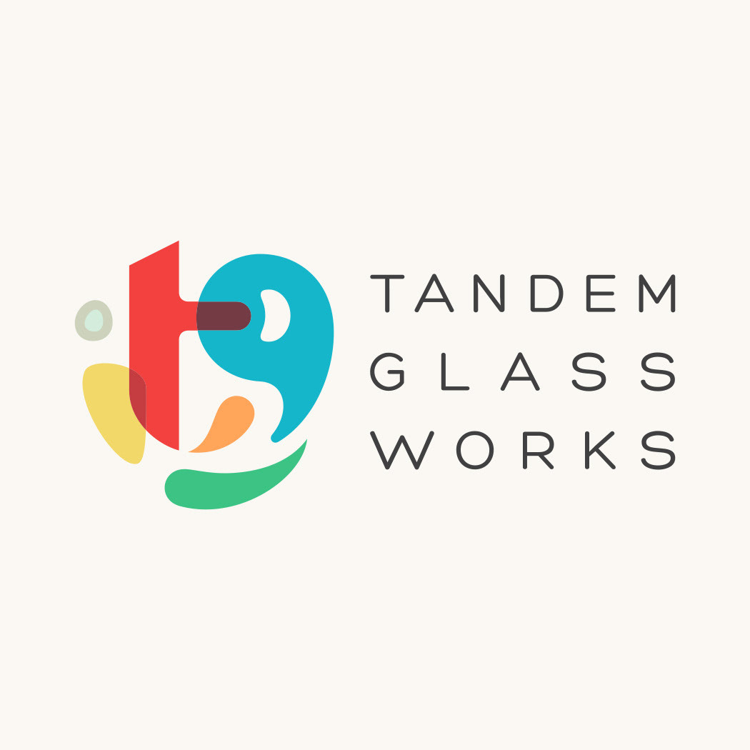 Tandem Glass Works logo design by Scott Whitehouse, featuring abstract TG monogram with organic, fun colorful shapes overlayed to look like glass and the named type stacked to the right..