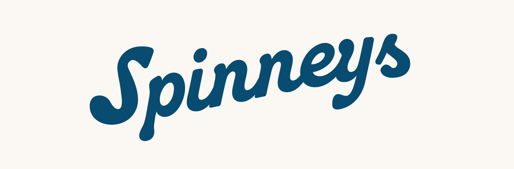 Spinneys ocean side restaurant logo type in a bold vintage script font