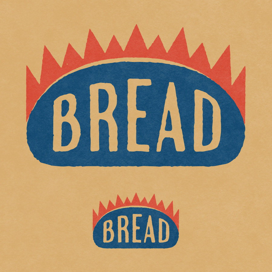 The word BREAD designed inside a loaf of bread surrounded by flames in a rustic vintage letterpress style Logo design for Counterpoint Bread in Bowdoinham, Maine, featuring an abstract loaf of rustic bread baking in a wood fired oven with flames and drawn in a rustic style with the words and type inside the shapes, by Scott Whitehouse for Counterpoint Bread.