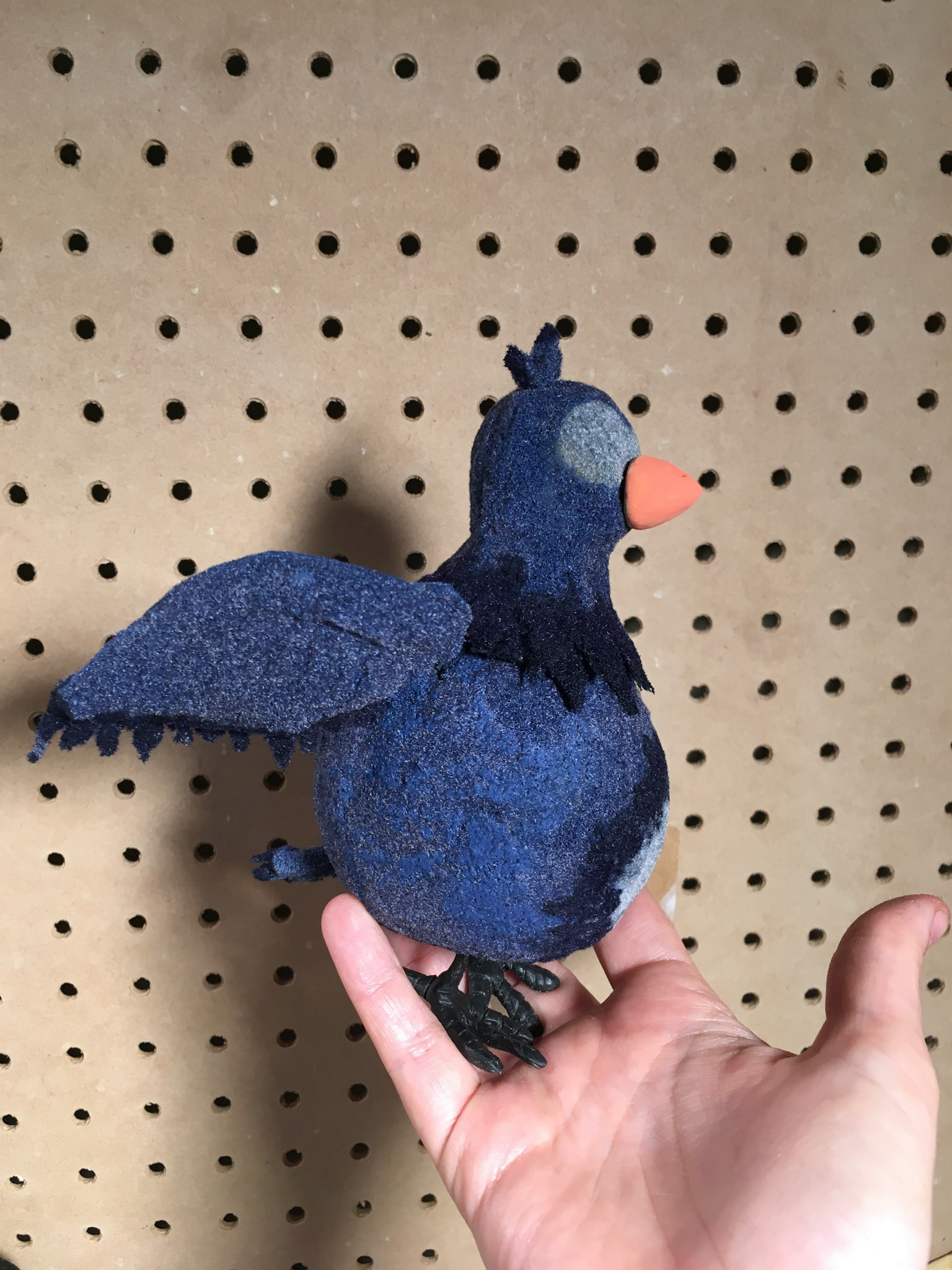 Finished Puppets : Flock, acrylic paint, carved foam, wire, embedded magnets. Beaks : Magic sculpt and magnets