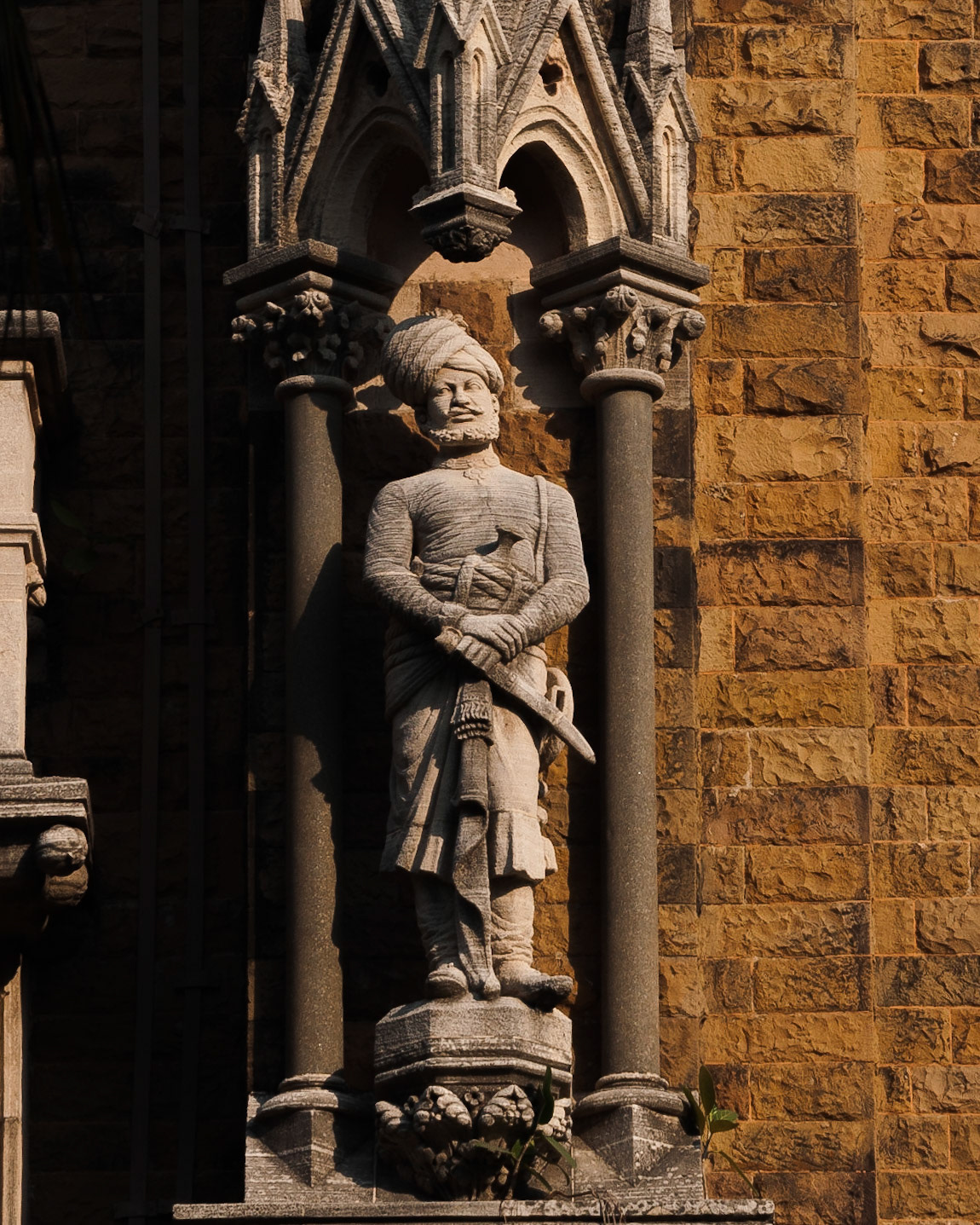 Mumbai University building at Fort campus. Intricate stone carving on the walls.