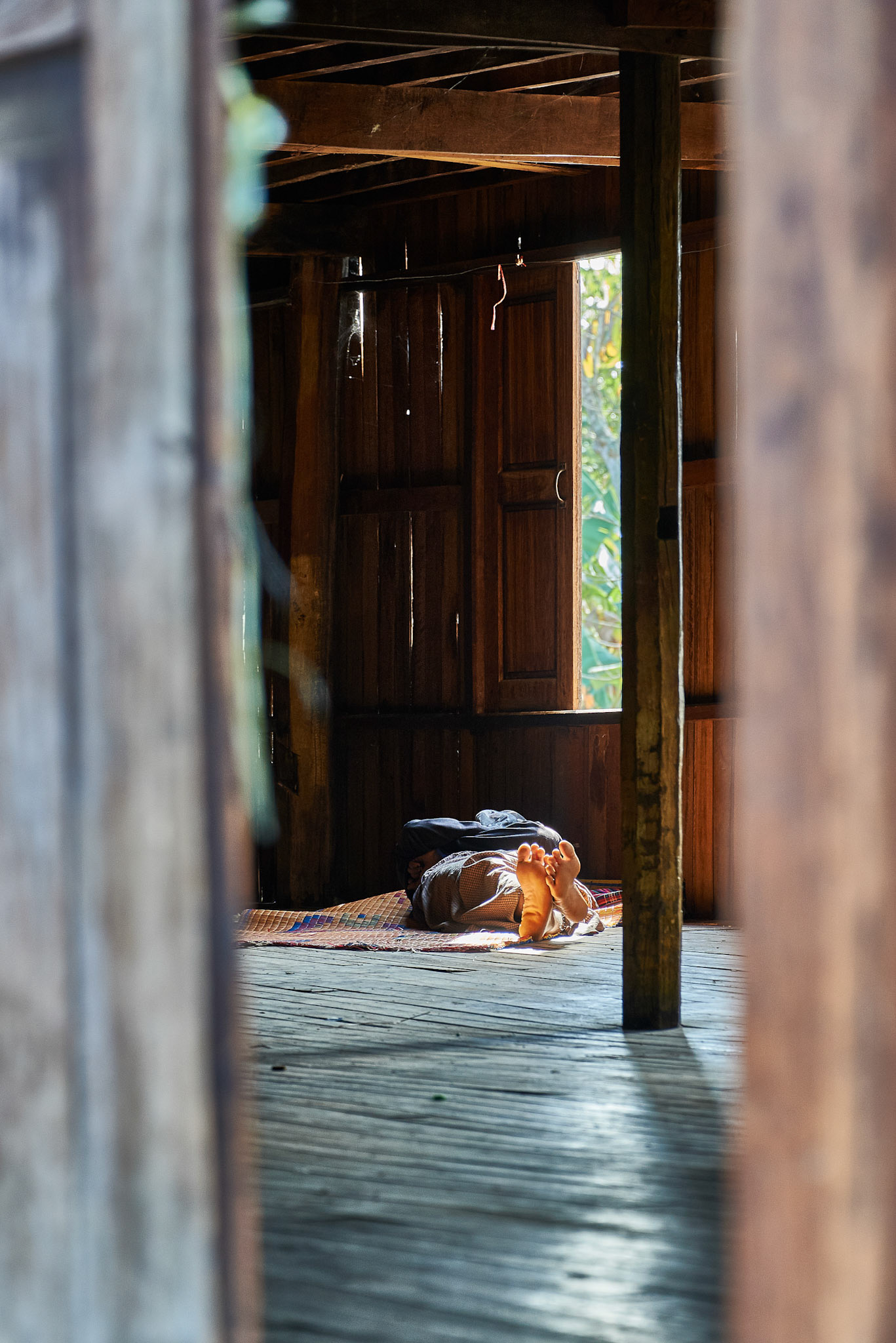 An open door to a house on Inle lake