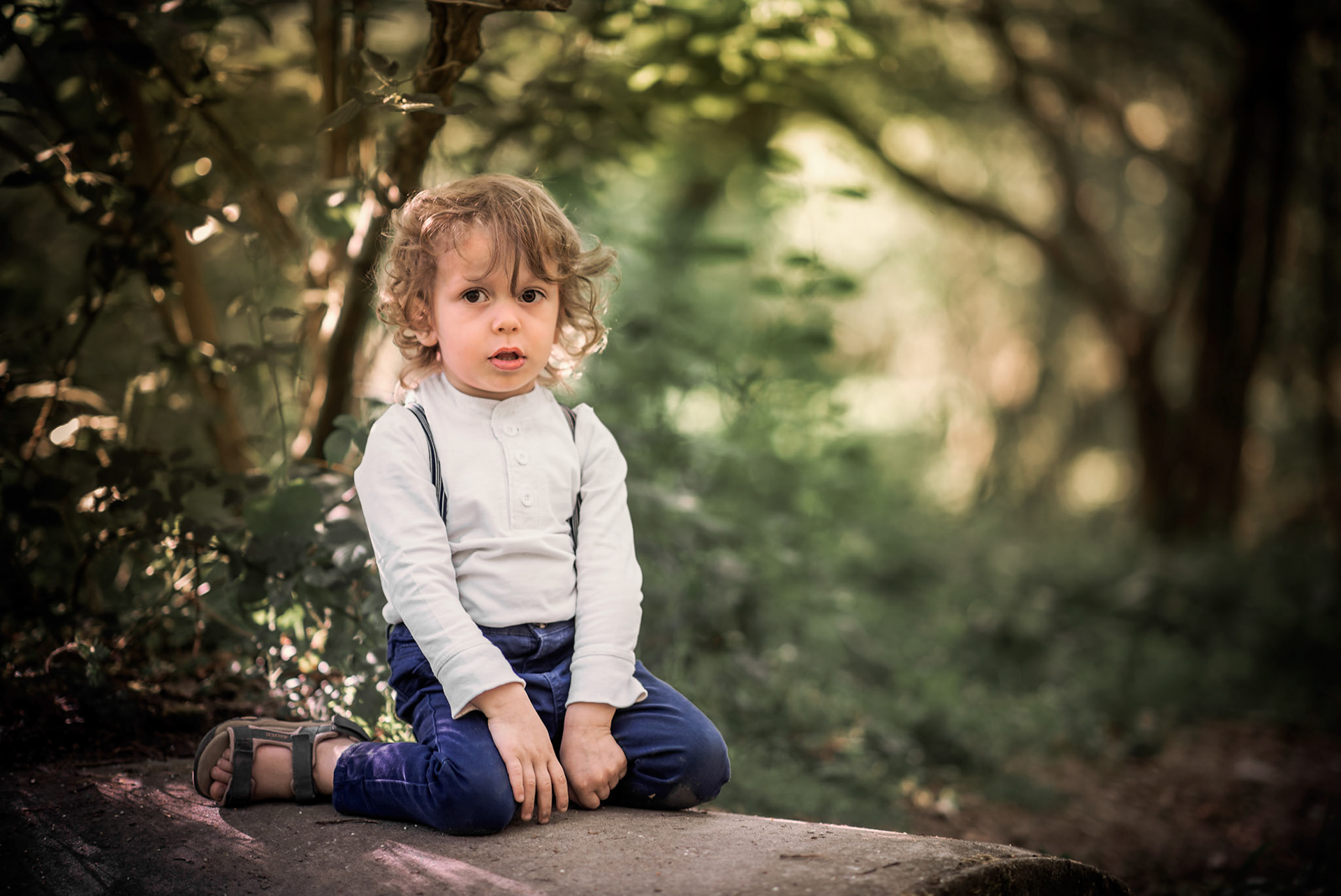 Theo on his favorite pipe in the forest.