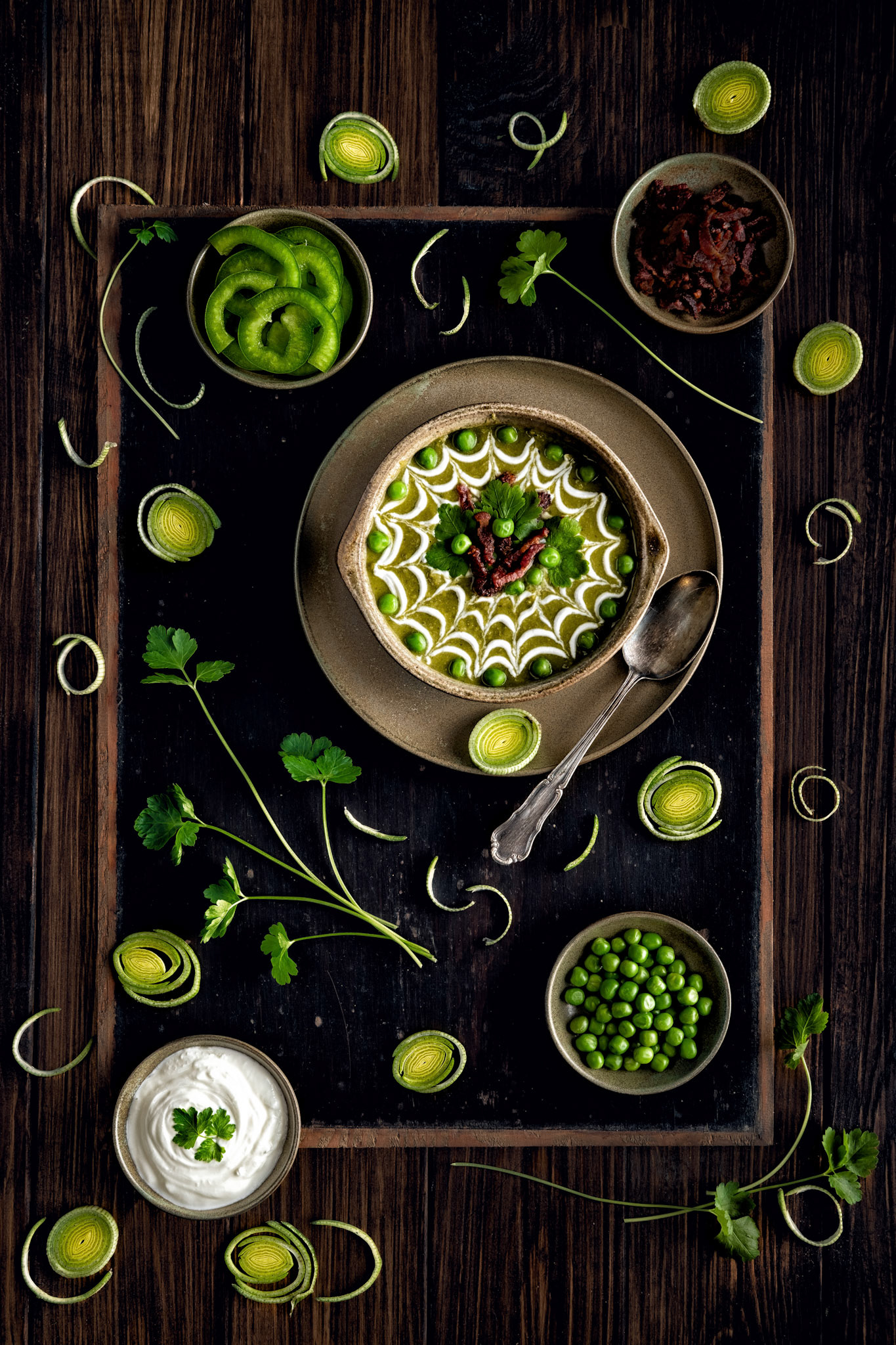 Homemade pea soup with cream and bacon