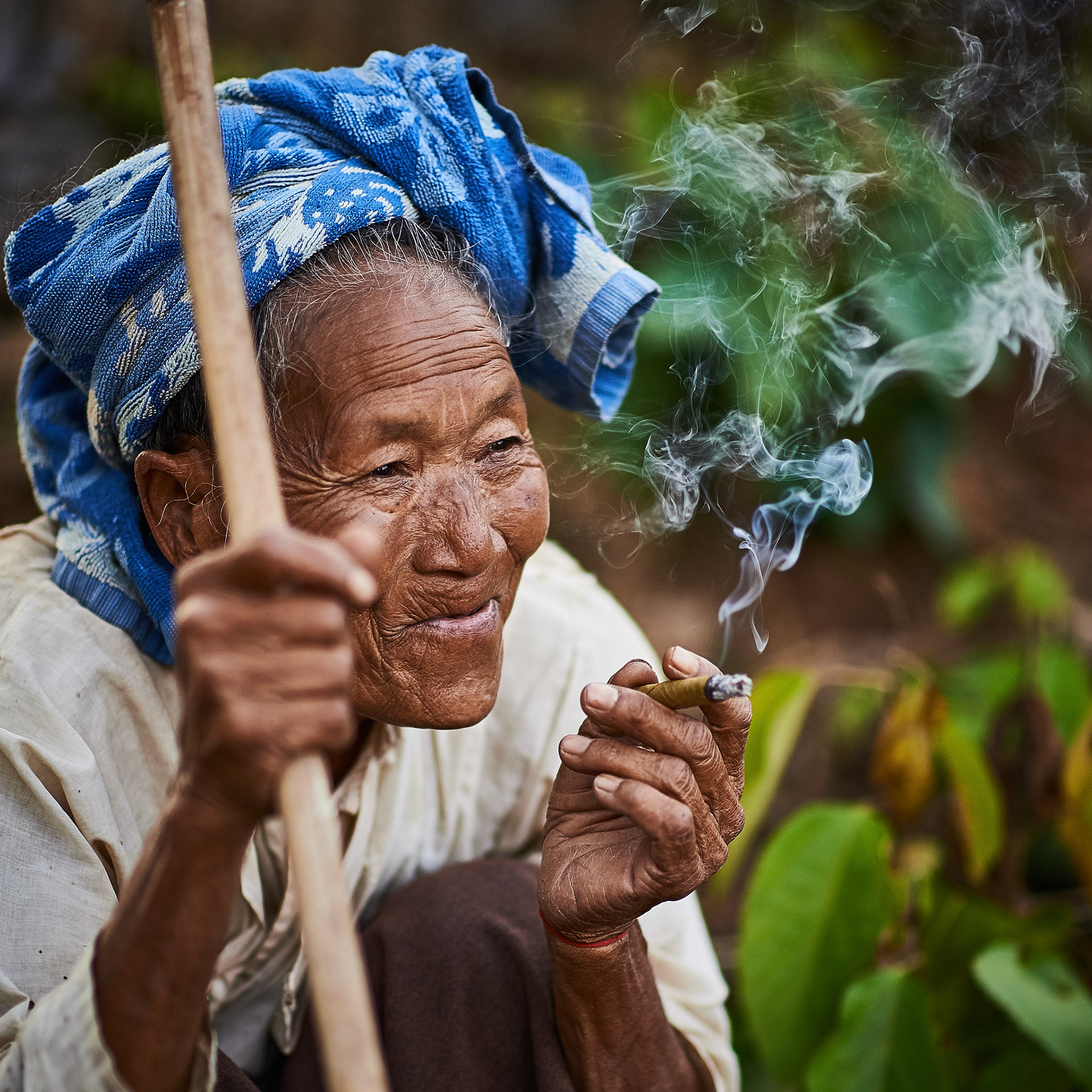We have found this old lady almost waiting for us. She lead us to an ancient place and took a sit. Although she was wearing a broken shirt on the back and her wrinkles were showing her age, she revealed an incredible beautiful smile with no retention. A smile coming from the heart. She was feeling like a star and she was actually one. Her happy mood was contagious. What an incredible lady!