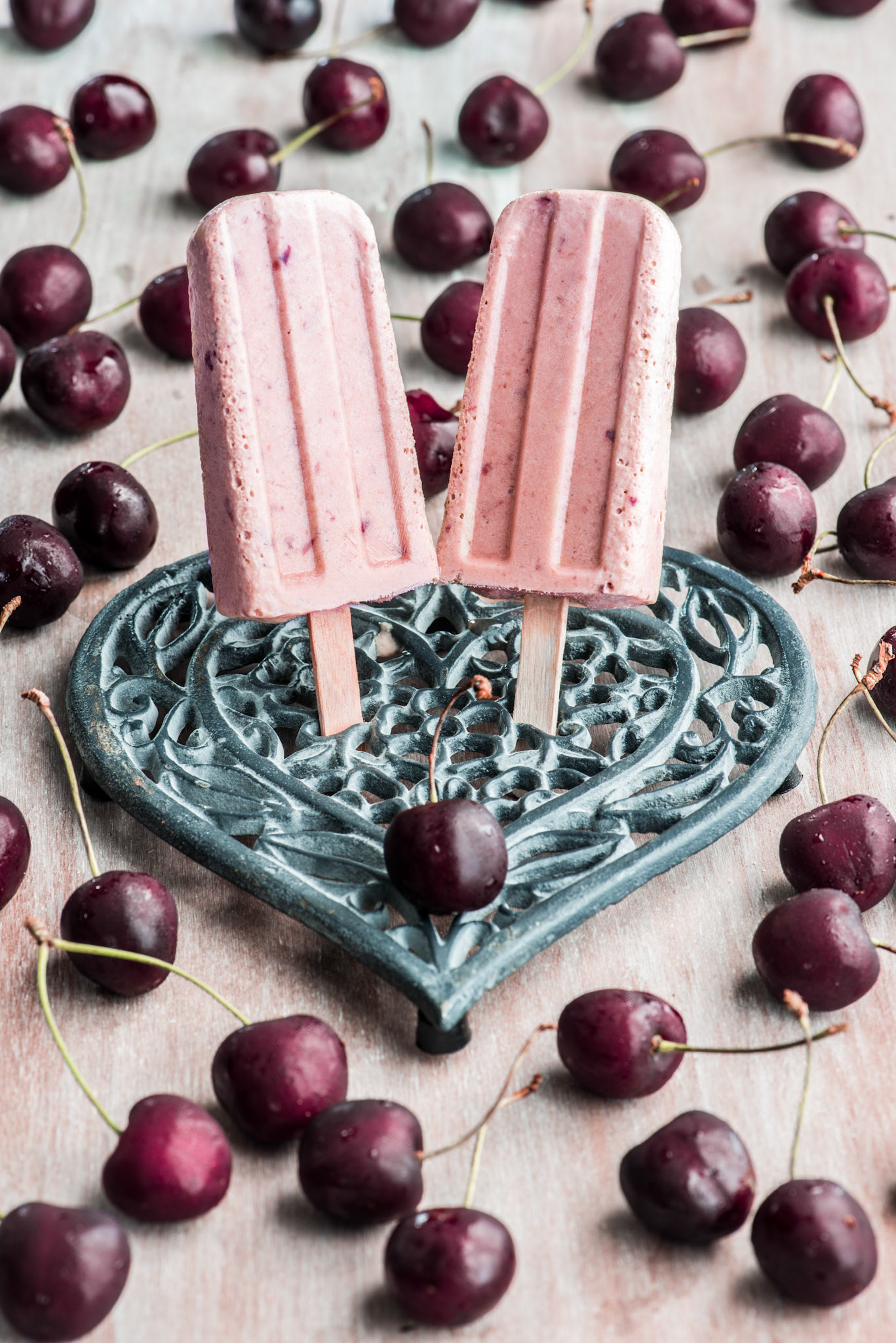 Cherry popsicle in a vintage heart shape support