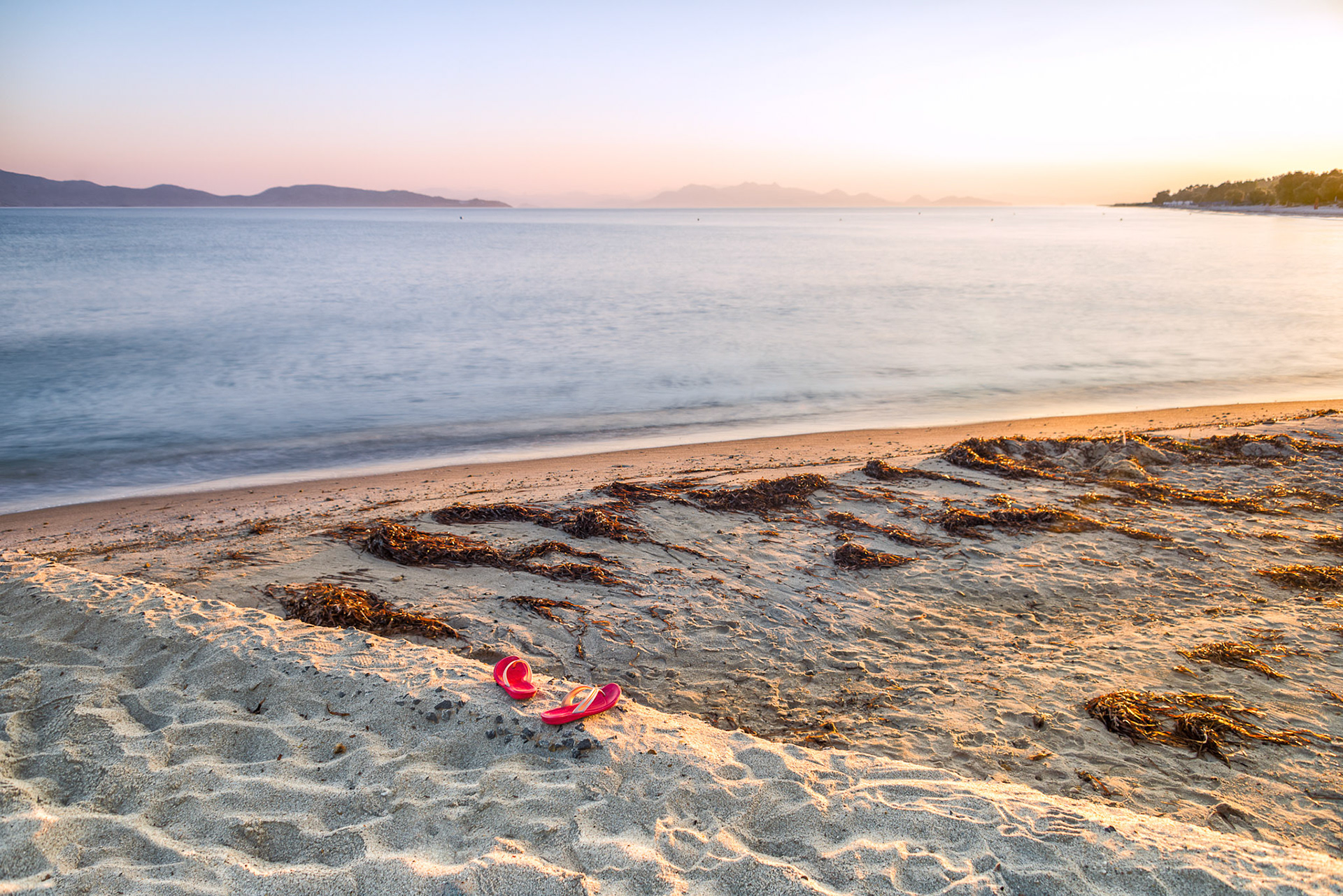 Let your slippers and walk bare feet on the cold sand of a beach in Kos. Enjoy the silence of the sea at sunrise.