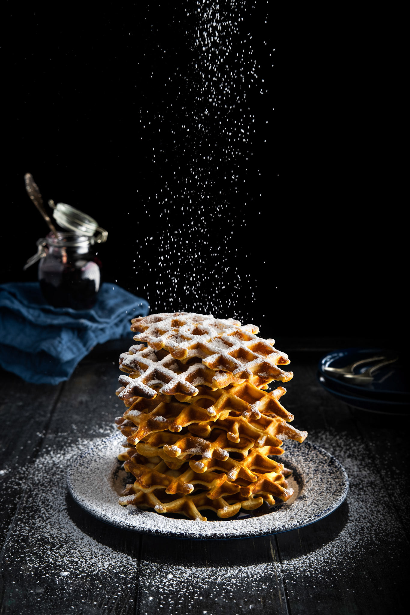 Fluffy and delicious waffles dusted with icing sugar