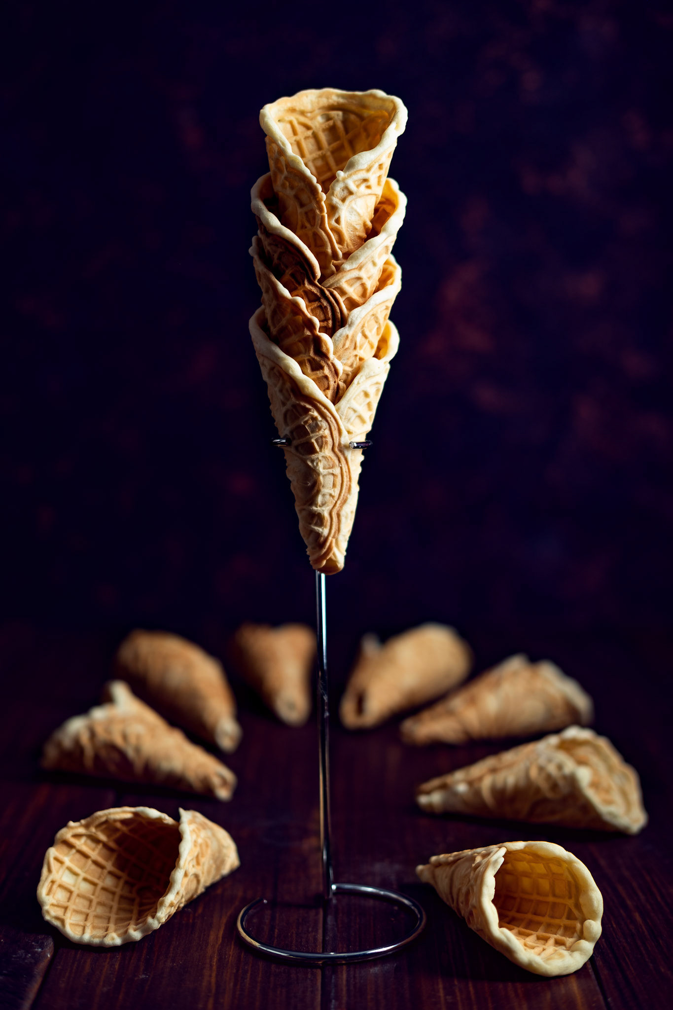 Homemade waffle cones on a dark background