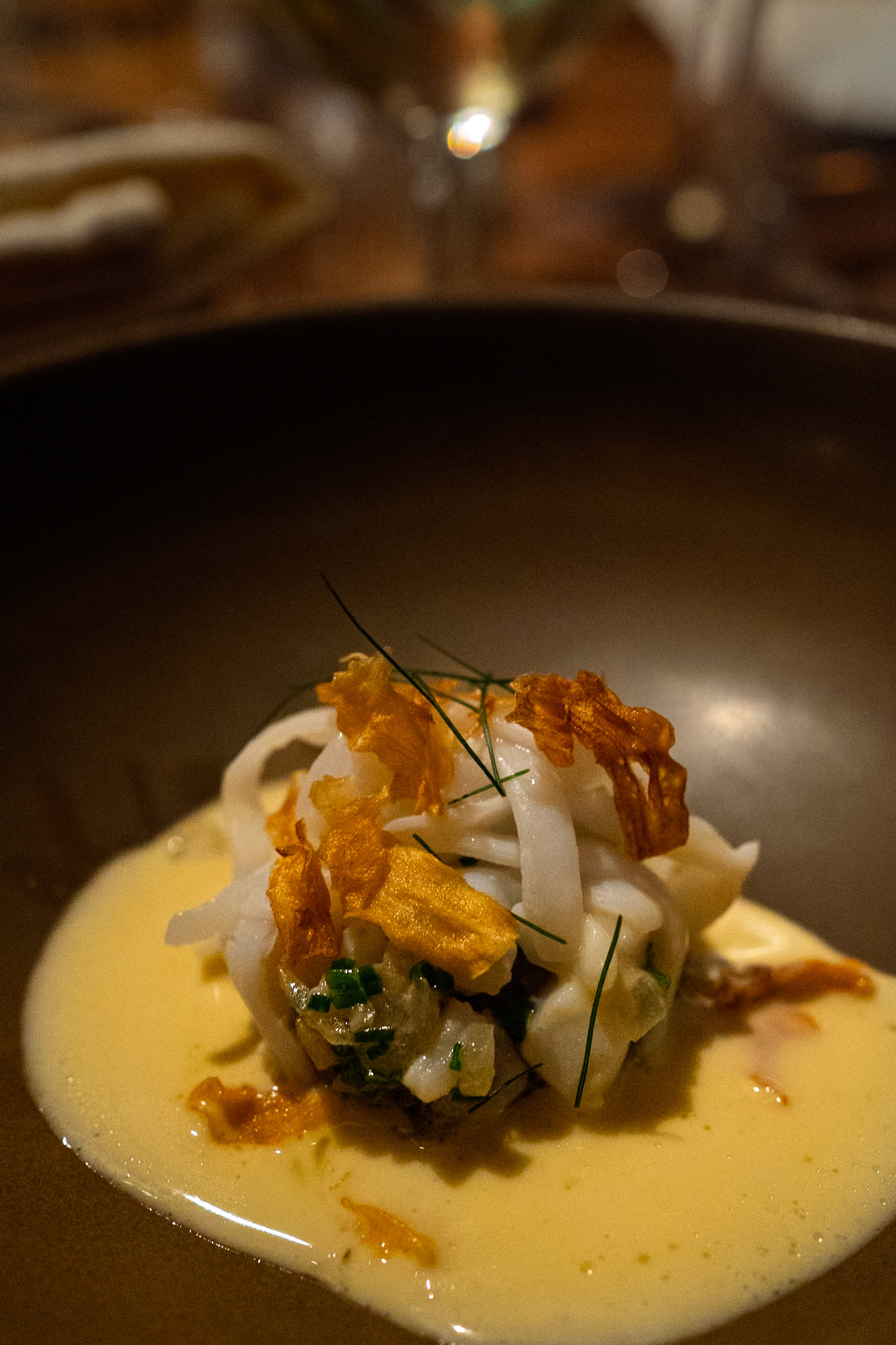 Alchemilla | Celeriac cooked in whey, squid, black garlic, green olive