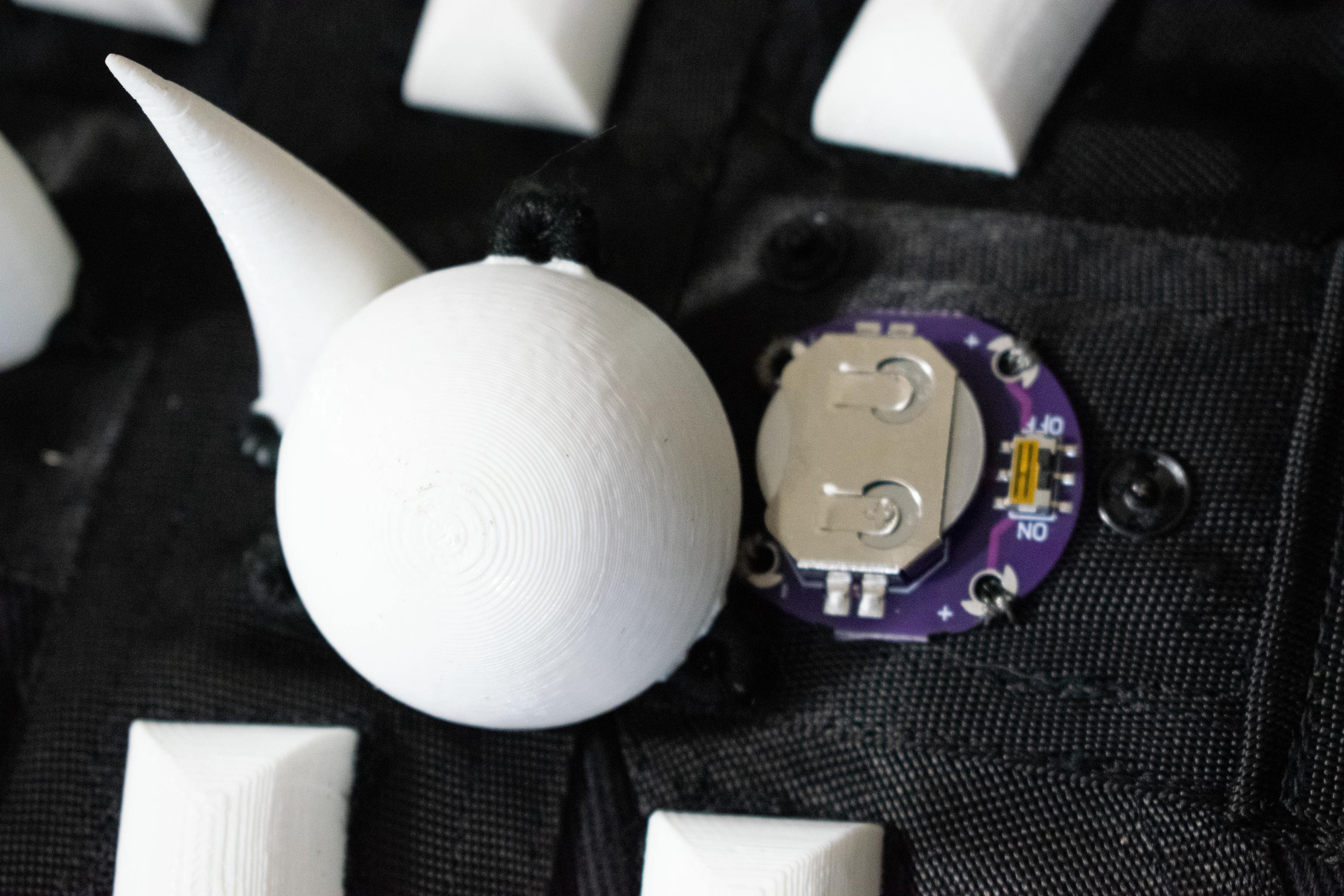 Snap closures hold the half-sphere in place