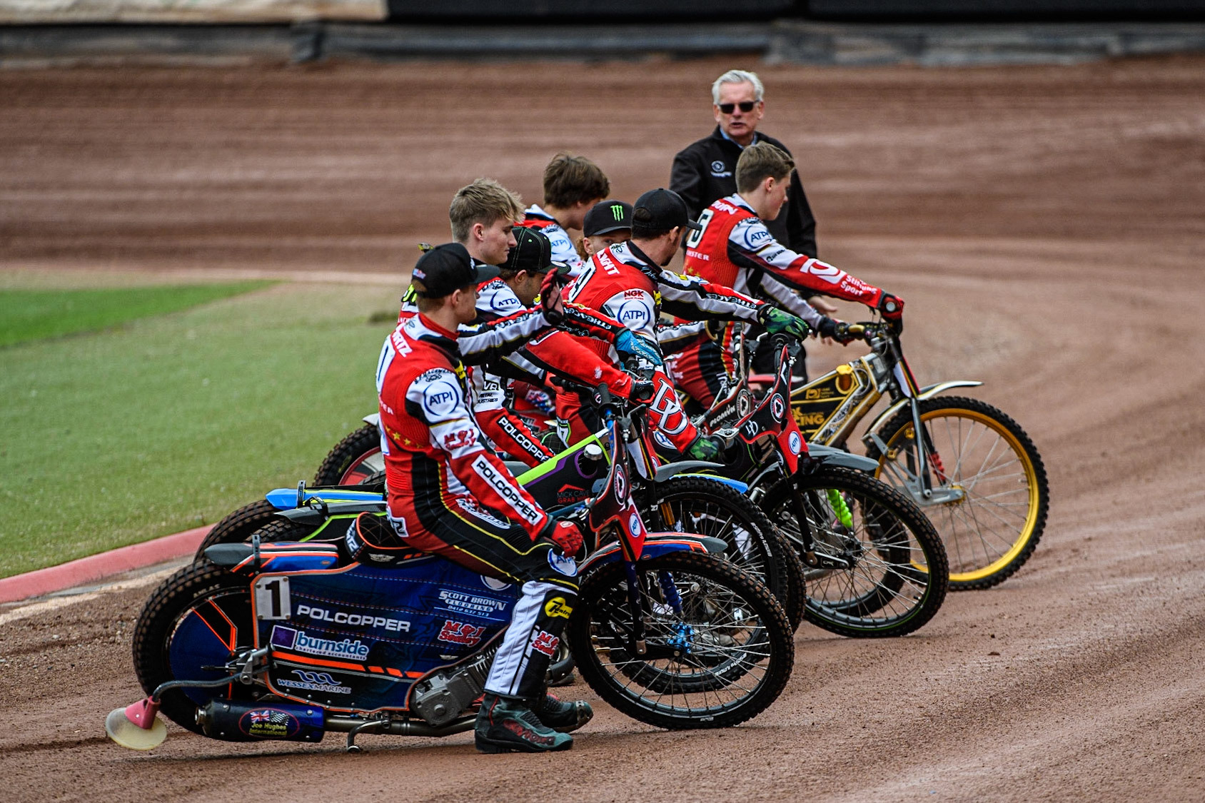 Belle Vue ATPI Aces line up for the fans on the back straight during the Sports Insure Premiership match between Belle Vue Aces and Leicester Lions at the National Speedway Stadium, Manchester on Monday 28th August 2023. (Photo: Ian Charles | MI News)