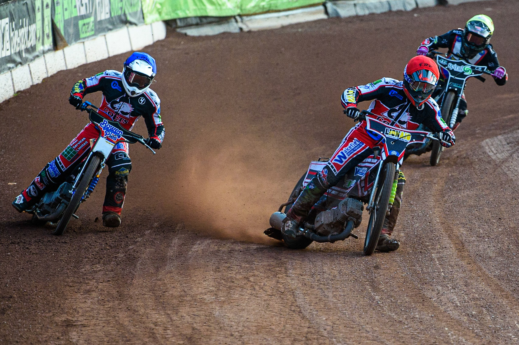 MANCHESTER, UK. JULY 23RD  Jack Parkinson-Blackburn  (Red) and Paul Bowen  (Blue) lead Connor King  (Yellow)during the National Development League match between Belle Vue Colts and Eastbourne Seagulls at the National Speedway Stadium, Manchester on Friday 23rd July 2021. (Credit: Ian Charles | MI News)