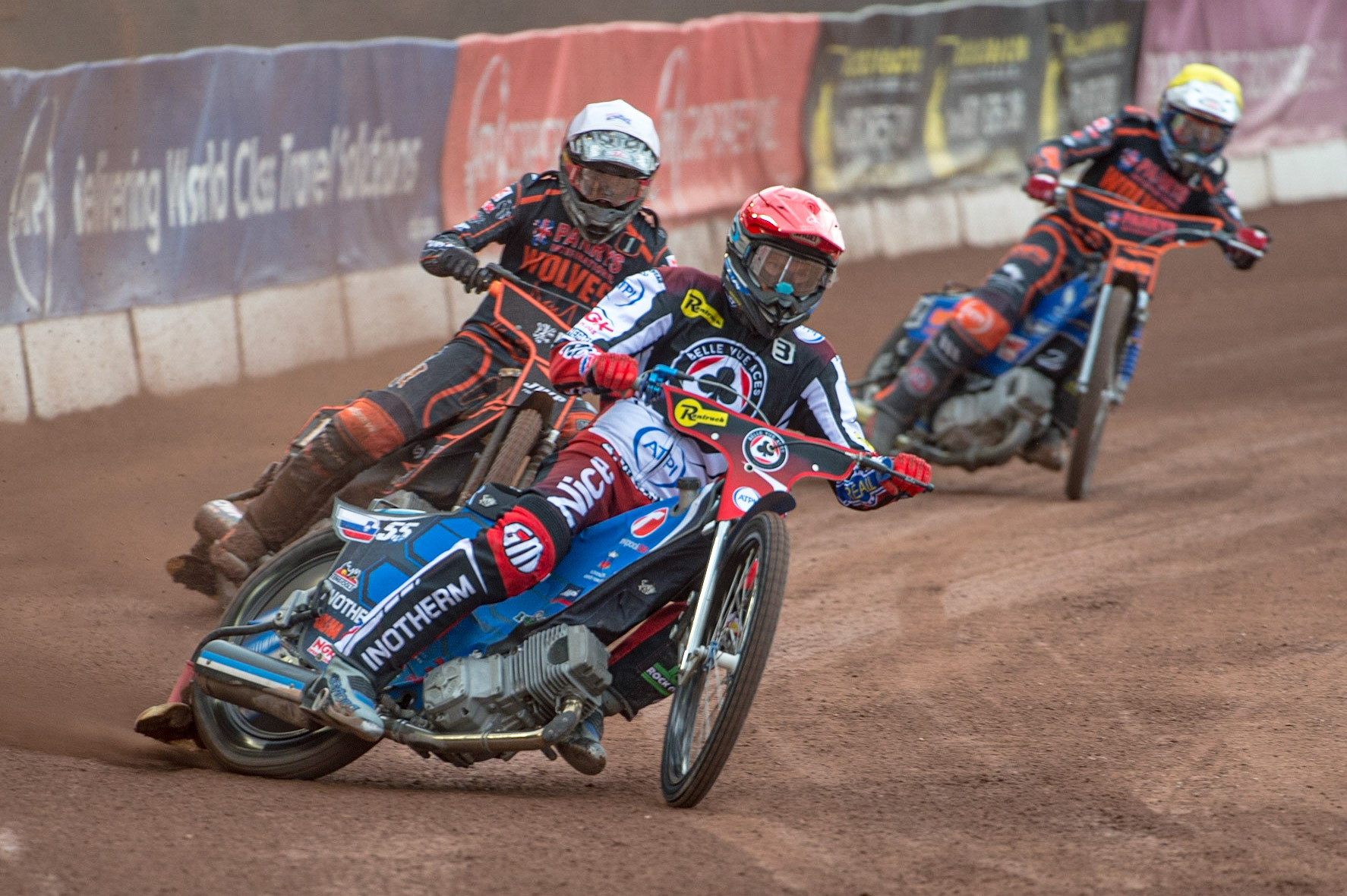 MANCHESTER, UK. JUN 13TH Matej Zagar (Red) leads Sam Masters  (White) and Steve Worrall  (Yellow) during the SGB Premiership match between Belle Vue Aces and Wolverhampton  Wolves at the National Speedway Stadium, Manchester on Monday 13th June 2022. (Credit: Ian Charles | MI News)