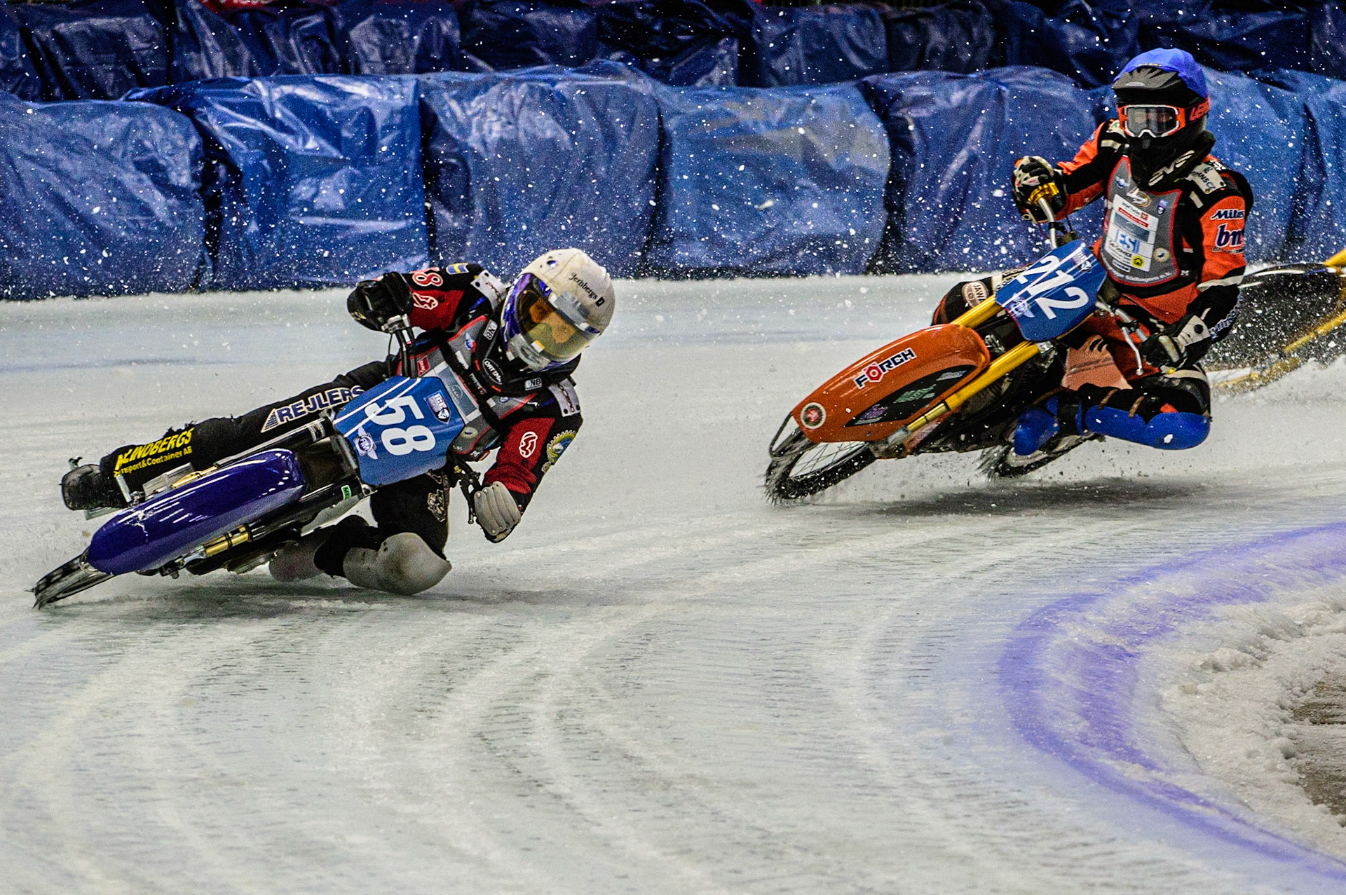 Stefan Svensson (58) (White) leads Lukas Hutla (212) (Blue) who appears to have hit a rut during the Ice Speedway Gladiators World Championship Final 1 at Max-Aicher-Arena, Inzell, Germany on Saturday 18th March 2023. (Photo: Ian Charles | MI News)