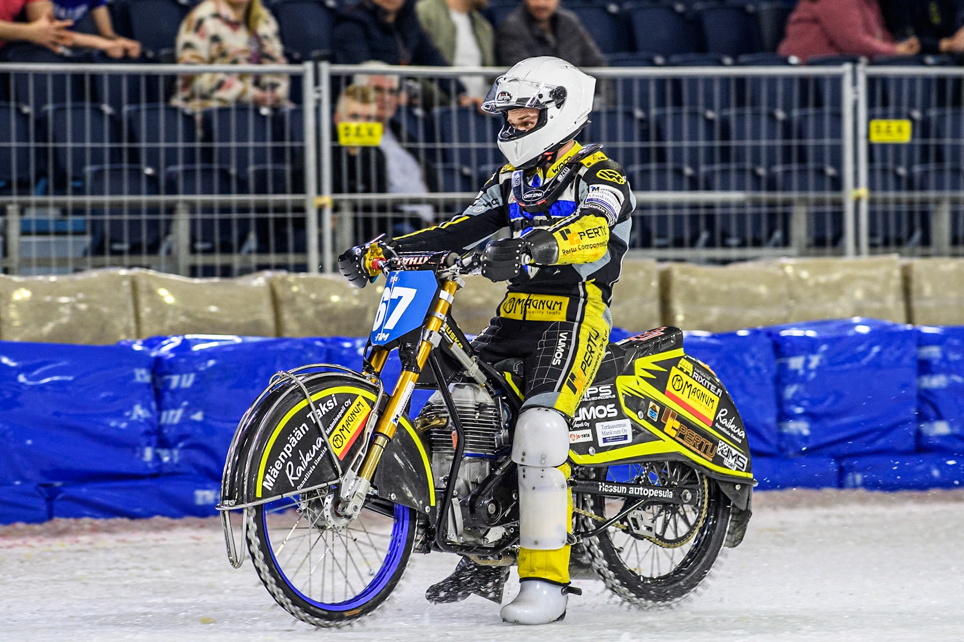 Finland's Heikki Huusko (67) rides back to the pits after his tae touching exclusion from the heat during the FIM Ice Speedway Gladiators World Championship Final 3 at Ice Rink Thialf, Heerenveen on Saturday 6th April 2024. (Photo: Ian Charles | MI News)