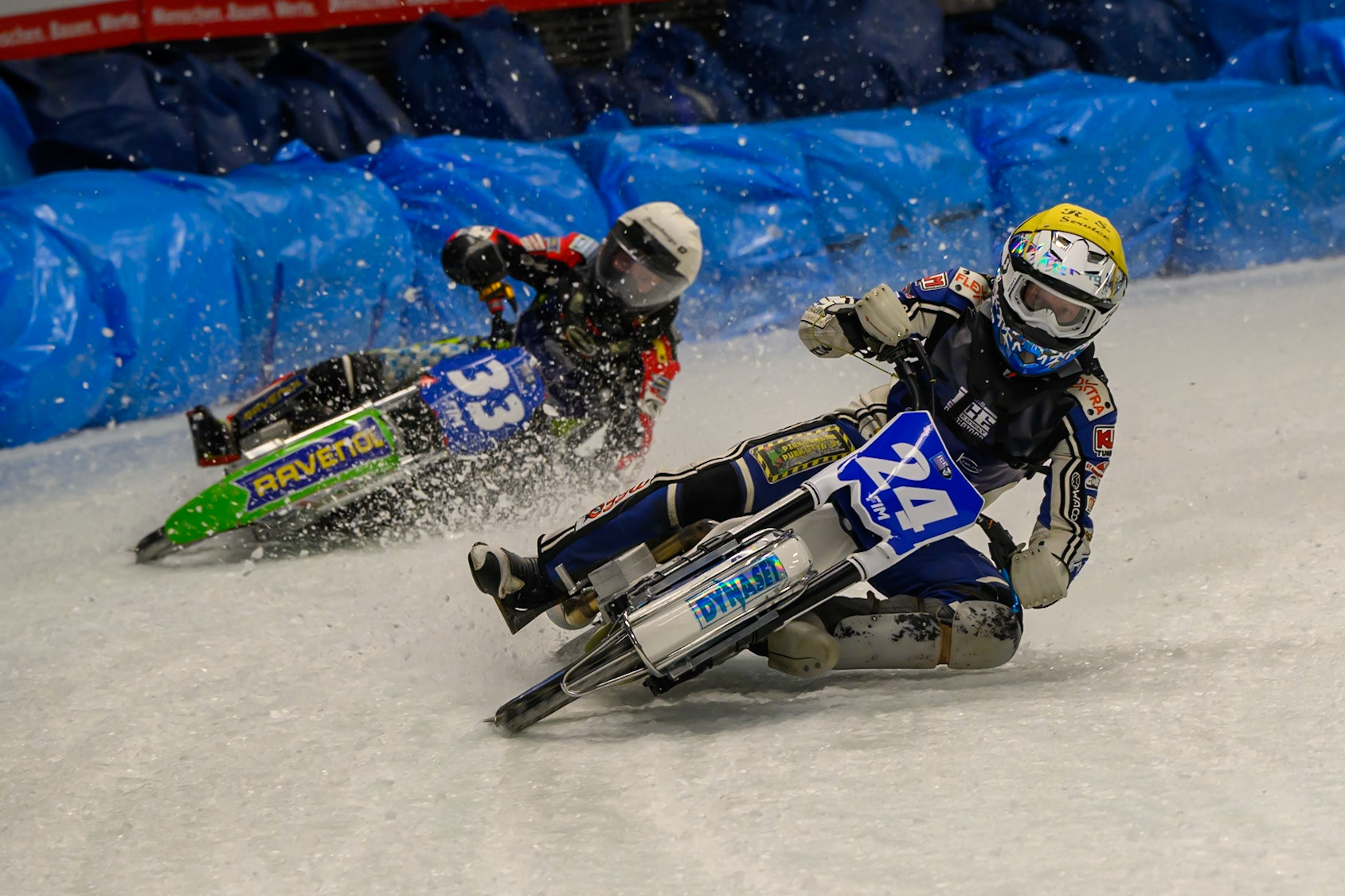 Max Koivula (24) of Finland  in Yellow leading Johann Weber (33) of Germany  in White during the Ice Speedway Gladiators World Championship Final 1 at Max-Aicher-Arena, Inzell on Saturday 14th March 2026. (Photo: Ian Charles | MI News)
