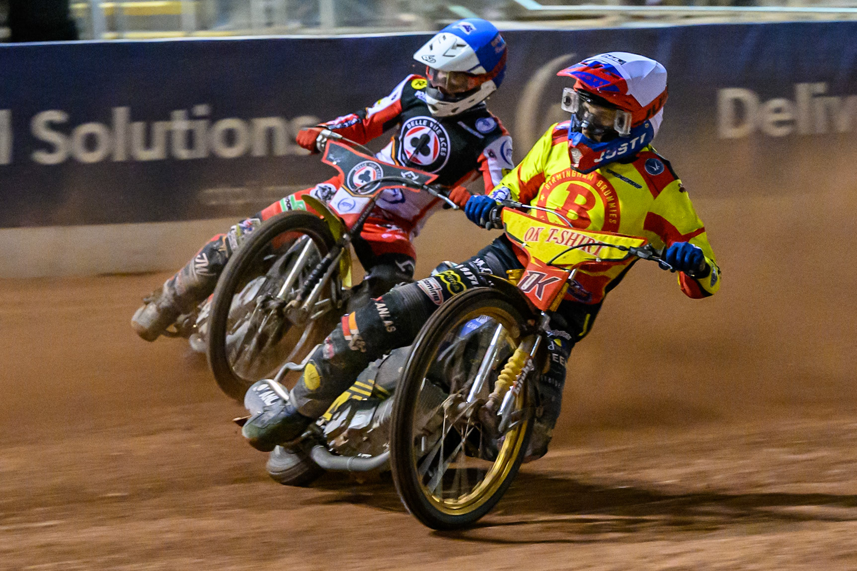 Paco Castagna of Birmingham Brummies  in White leading Tate Zischke of Belle Vue Aces  in Blue during the Rowe Motor Oil Premiership match between Belle Vue Aces and Birmingham Brummies at the National Speedway Stadium, Manchester on Monday 18th August 2025. (Photo: Ian Charles | MI News)