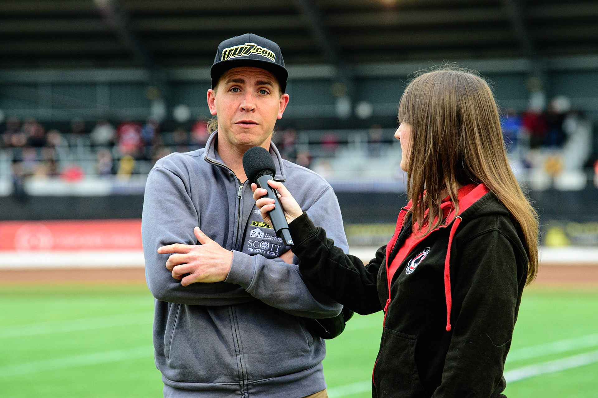 MANCHESTER, UK. JUN 6TH Richie Hawkins  (left) is interviewed by Belle Vue meeting presenter Hayley Bromley  during the SGB Premiership match between Belle Vue Aces and Ipswich Witches at the National Speedway Stadium, Manchester on Monday 6th June 2022. (Credit: Ian Charles | MI News)