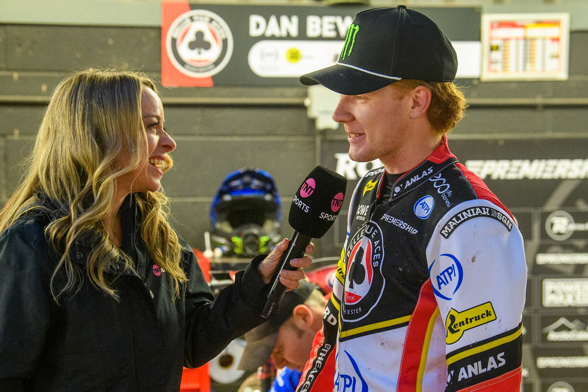 Belle Vue Aces' Dan Bewley (Right) is interviewed by TNT Sports presenter Abi Stevens during the Rowe Motor Oil Premiership match between Belle Vue Aces and Leicester Lions at the National Speedway Stadium, Manchester on Monday 19th May 2025. (Photo: Ian Charles | MI News)