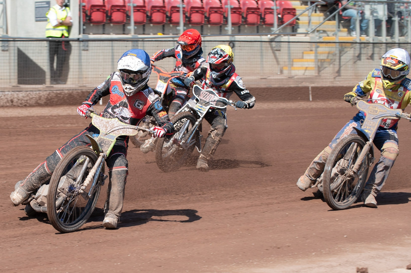 Photo: Ian Charles

Ben Rathbone (Blue) leads Luke Priest (White), Joe Alcock (Yellow) and Jordan Palin (Red)

Belle Vue Colts v Stoke Potters, National League, Belle Vue National Speedway Stadium, Manchester, Friday 19  April  2019