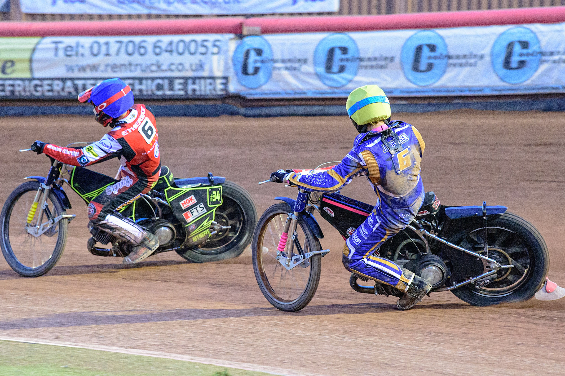 MANCHESTER UK  Thomas Jorgensen  (Yellow) chases Jye Etheridge  (Blue) during the SGB Premiership match between Belle Vue Aces and King's Lynn Stars at the National Speedway Stadium, Manchester on Monday 11th July 2022. (Credit: Ian Charles | MI News)