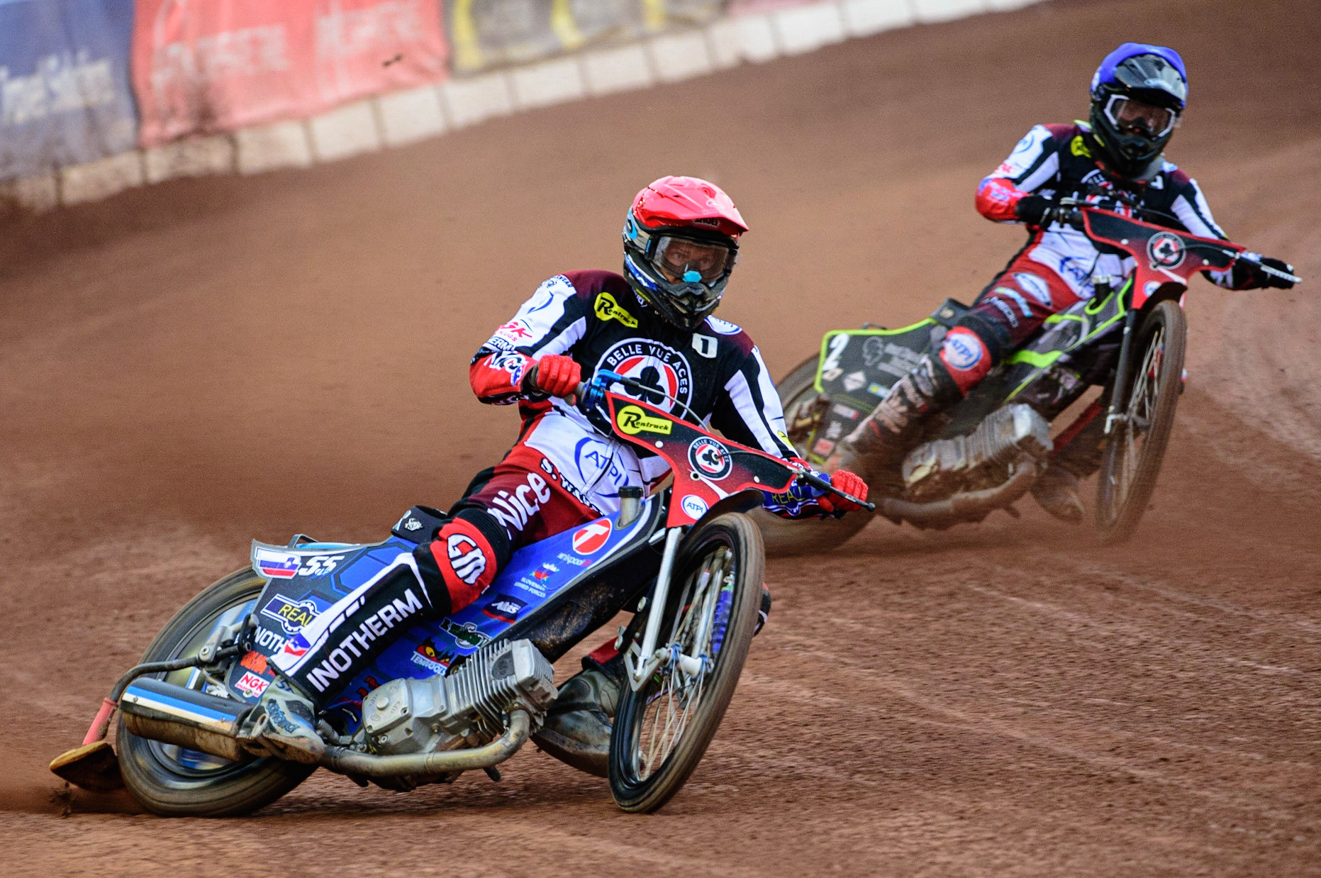 MANCHESTER UK  Matej Zagar (Red) leads team mate Tom Brennan  (Blue)during the SGB Premiership match between Belle Vue Aces and King's Lynn Stars at the National Speedway Stadium, Manchester on Monday 11th July 2022. (Credit: Ian Charles | MI News)