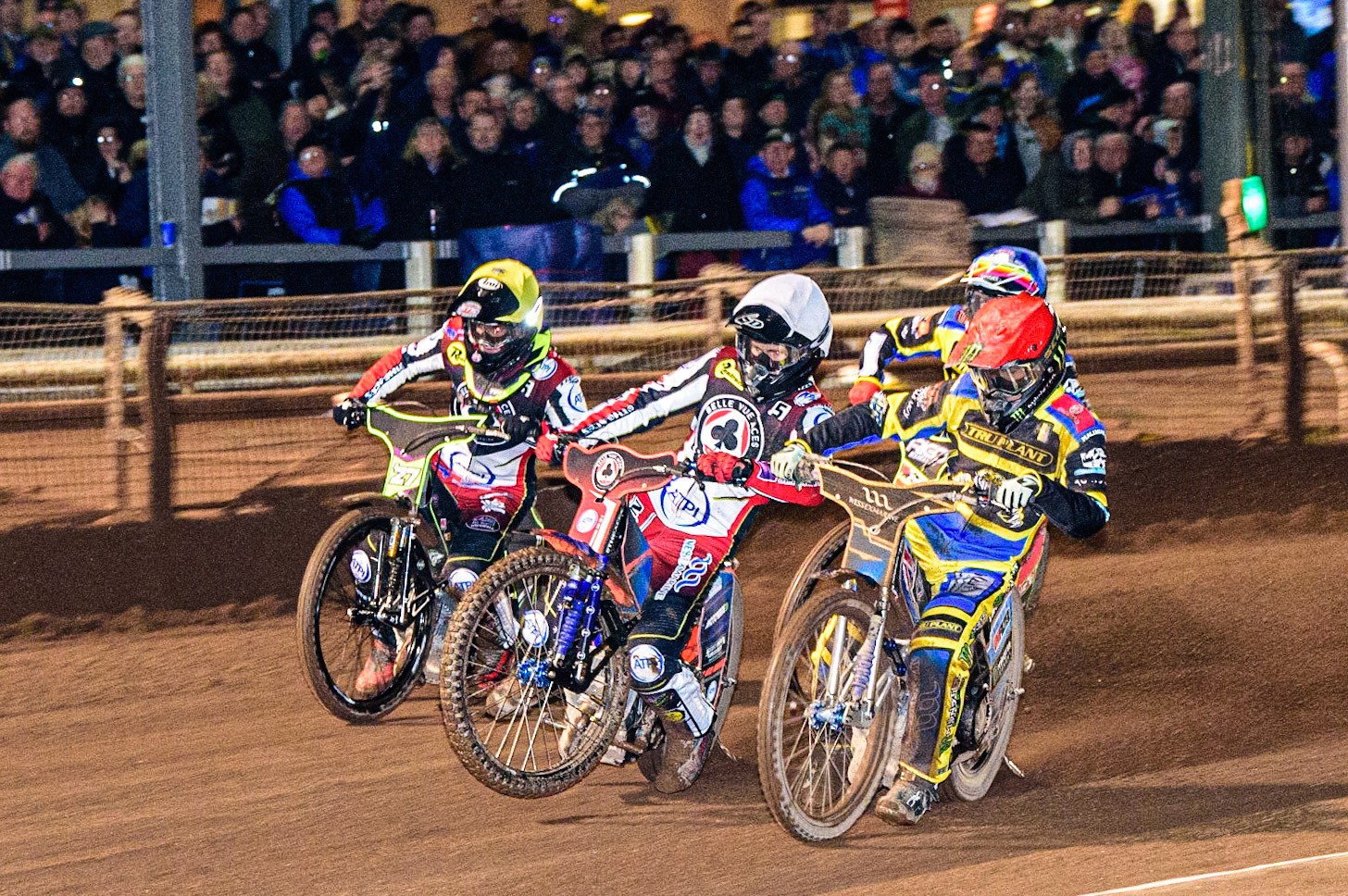 Brady Kurtz  (White) picks up some drive alongside Jack Holder  (Red), Tom Brennan  (Yellow) with David Bellego  (Blue) behind during the Sheffield Tigers vs Belle Vue Aces meeting in the SGP Premiership at Owlerton Stadium, Sheffield on Thursday 23rd March 2023. (Photo: Ian Charles | MI News)