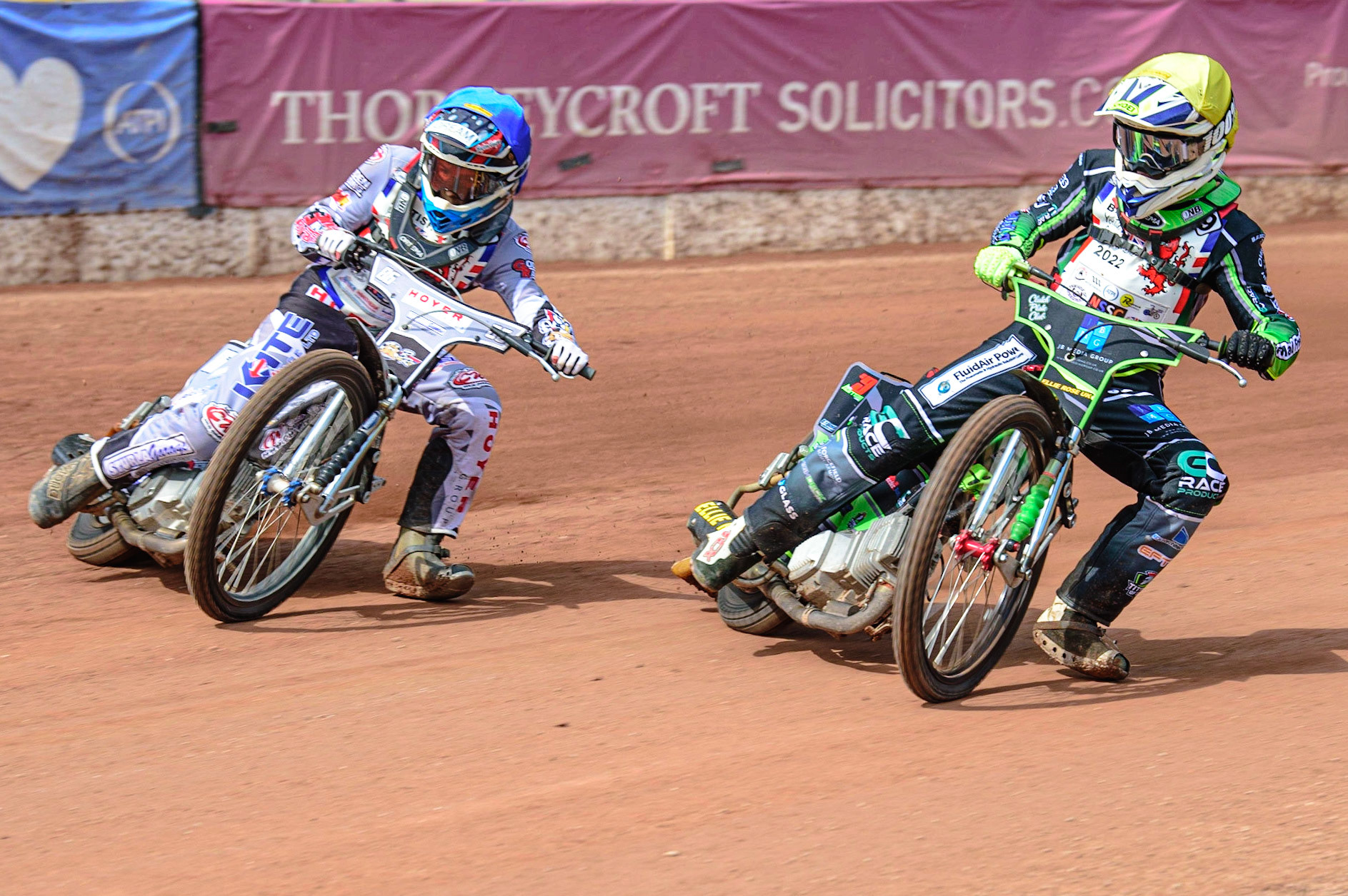 MANCHESTER, UK. JUN 3RD Luke Harrison (9) (Yellow) inside Sonny Springer (86)  (Blue) during the British Youth Speedway Championship (Round 4)  at the National Speedway Stadium, Manchester on Friday 3rd June 2022. (Credit: Ian Charles | MI News)