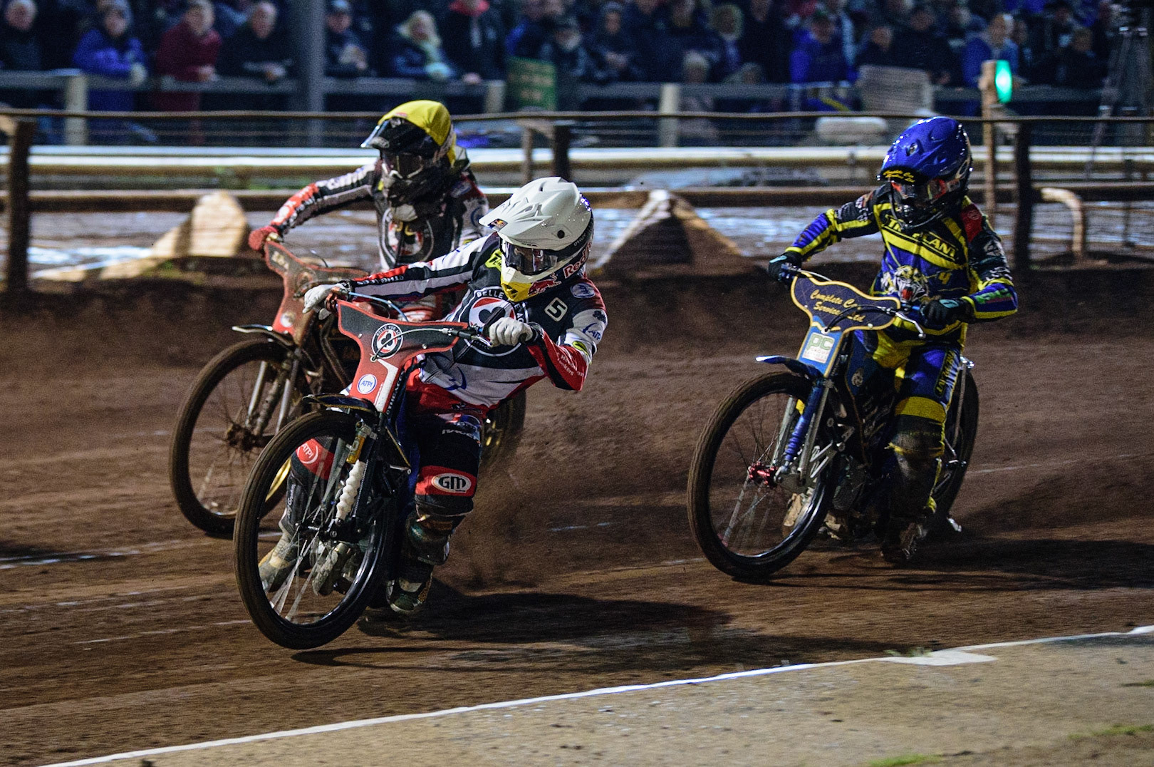 Robert Lambert  (White) leads Norick Blödorn (Yellow) and Kyle Howarth (Blue) during the SGB Premiership Grand Final 2nd Leg between Sheffield Tigers and Belle Vue Aces at Owlerton Stadium, Sheffield on Thursday 13th October 2022. (Credit: Ian Charles | MI News)