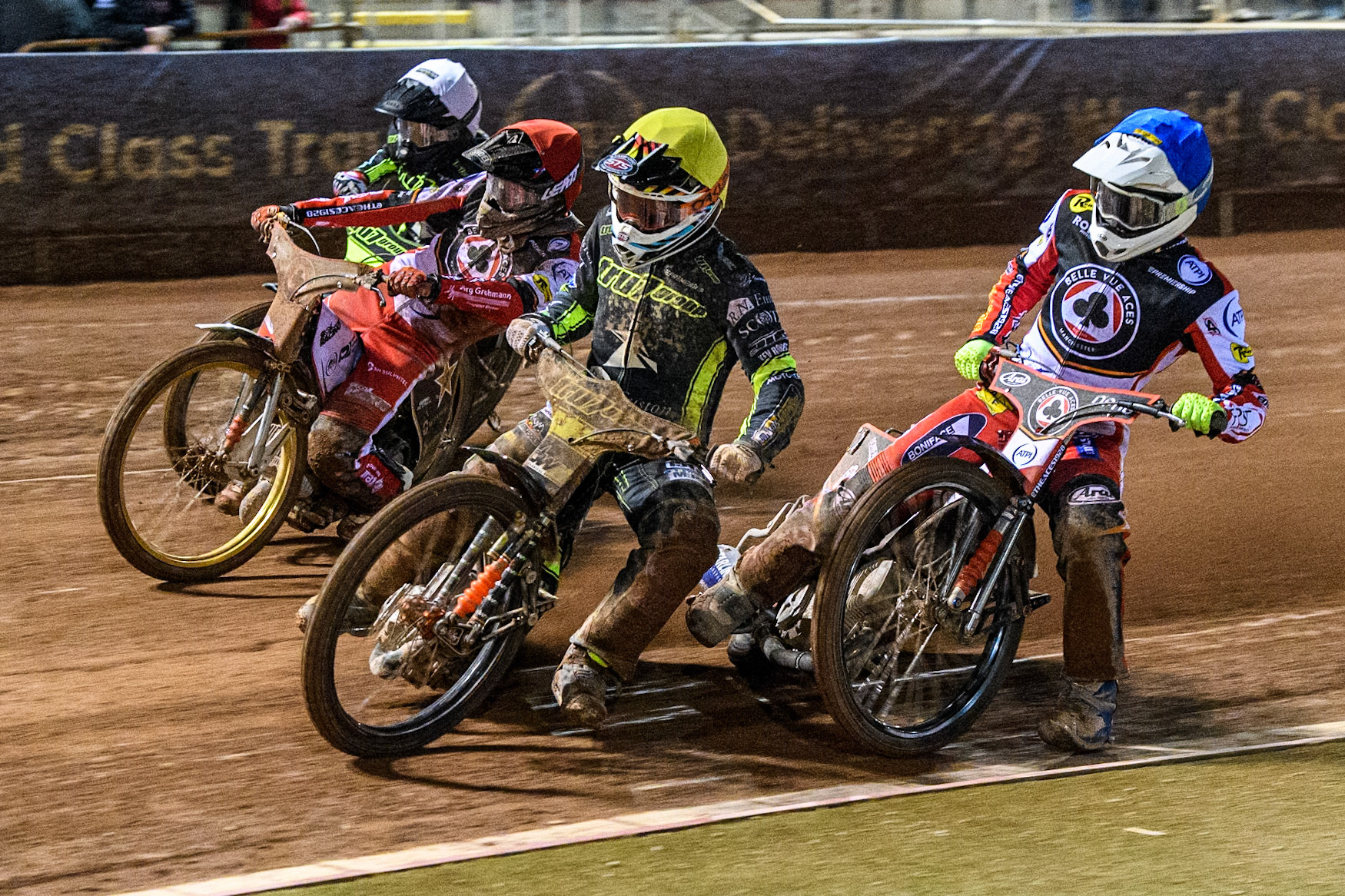 (L to R): Danny King of Ipswich Witches in White, Norick Blödorn of Belle Vue Aces in Red Jordan Jenkins of Ipswich Witches and Jake Mulford of Belle Vue Aces in Blue leave the start during the Premiership Cup Quarter Final 1st Leg match between Belle Vue Aces and Ipswich Witches at the National Speedway Stadium, Manchester on Monday 24th March 2025. (Photo: Ian Charles | MI News)