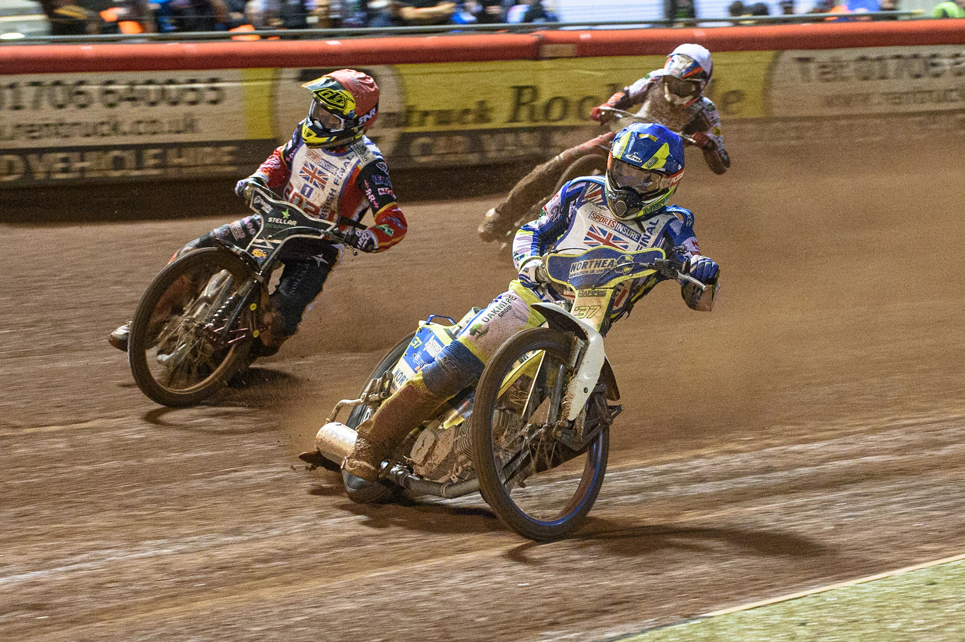 MANCHESTER, UK. AUGUST 16TH   Chris Harris  (Blue) inside Scott Nicholls  (Red) with Steve Worrall  behind during the Sports Insure British Speedway Finals at the National Speedway Stadium, Manchester on Monday 16th August 2021. (Credit: Ian Charles | MI News)