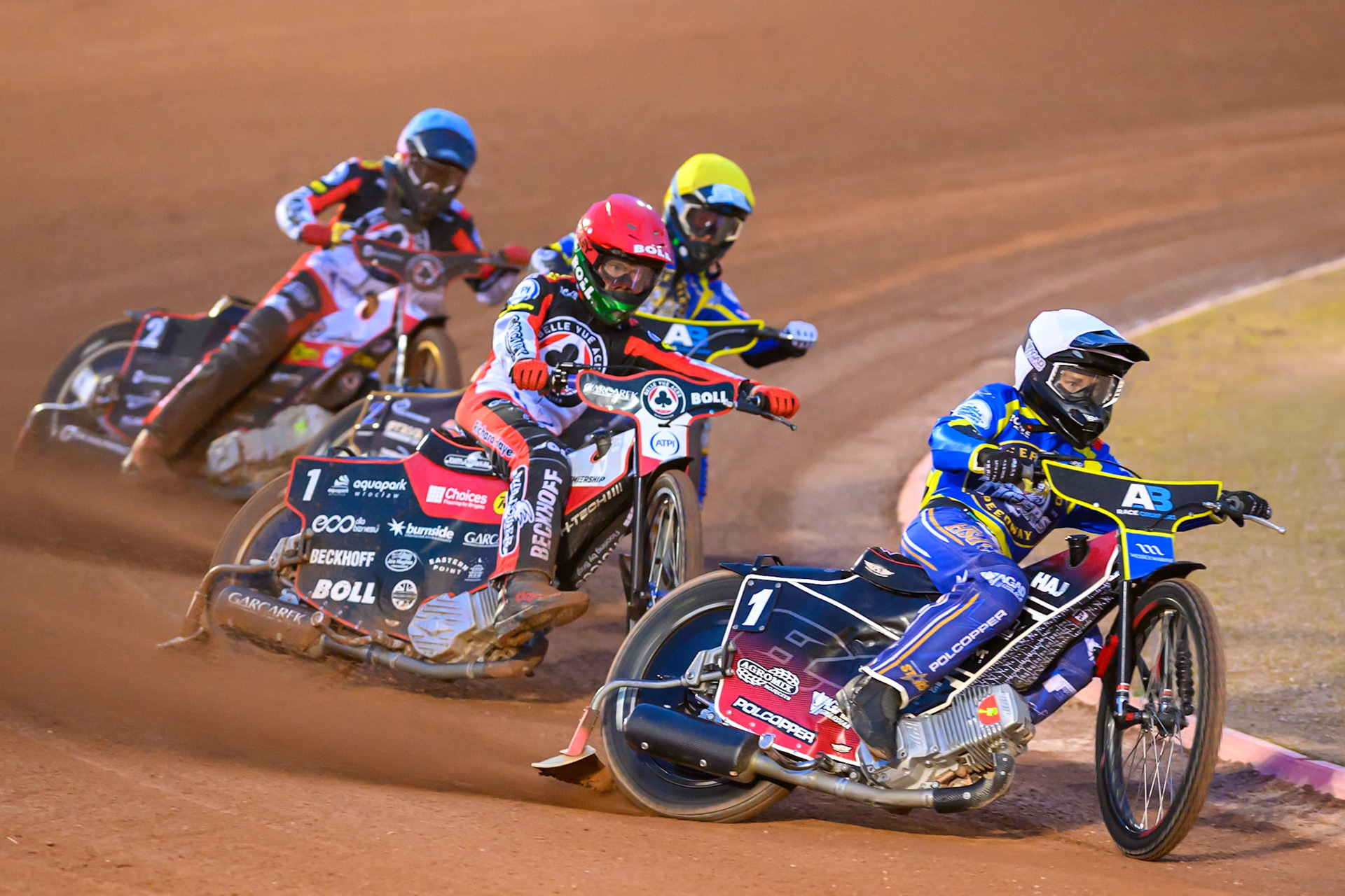 Ben Cook, Guest Rider for Sheffield Tigers in White leading Brady Kurtz of Belle Vue Aces in Red , Norick Blödorn of Belle Vue Aces in Blue and Anders Rowe of Sheffield Tigers in Yellow during the Rowe Motor Oil Premiership match between Belle Vue Aces and Sheffield Tigers at the National Speedway Stadium, Manchester on Monday 14th September 2026. (Photo: Ian Charles | MI News)
